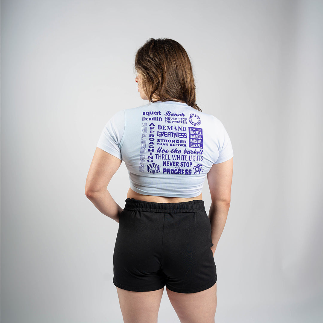 Back view of A7 Affirmation True-Fit Women's Crop – Pastel showcasing motivational mantras in white text on pastel fabric.