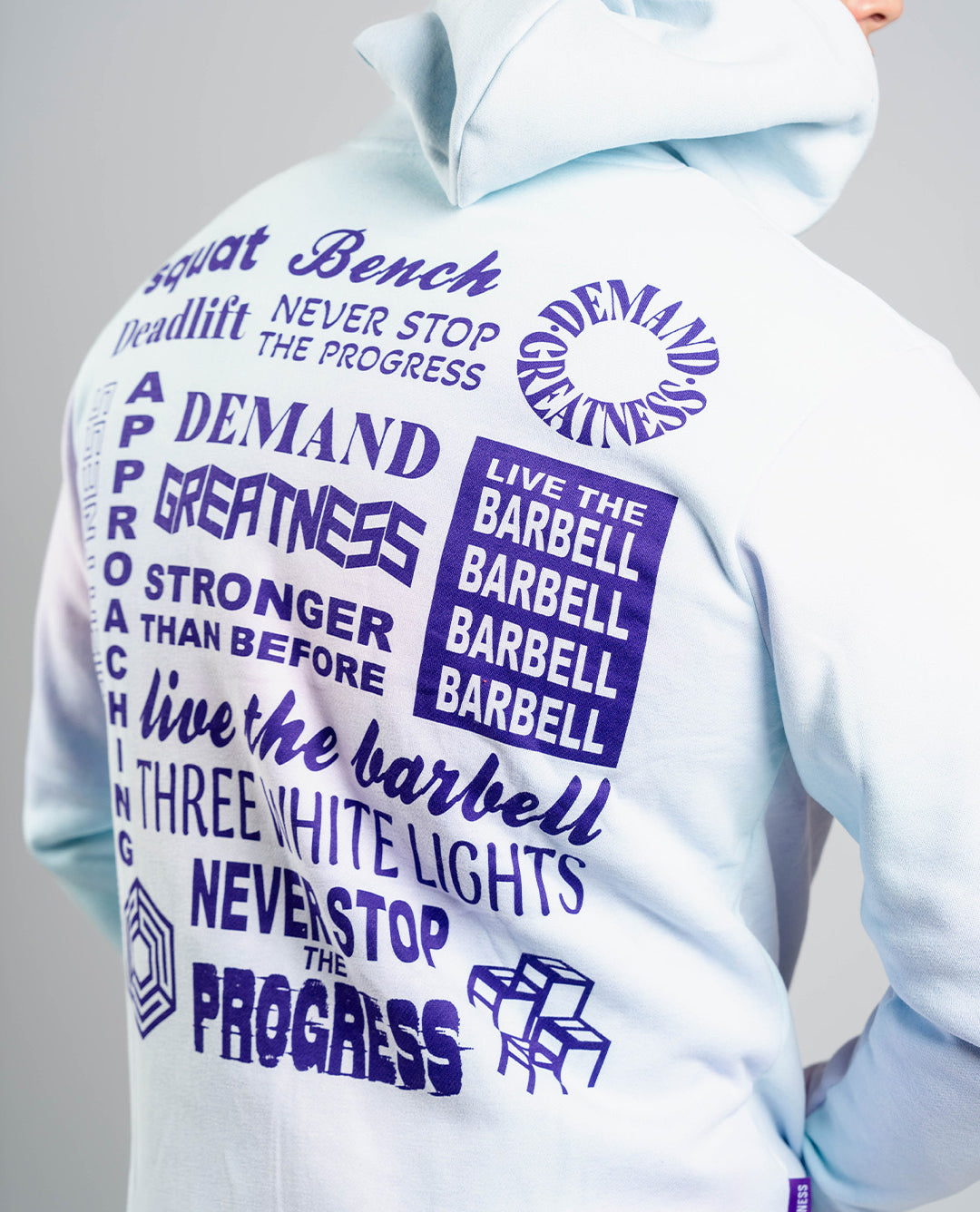 Back view of A7 Affirmation Zip Hoodie – Pastel showcasing motivational mantras in contrasting text on pastel fabric.