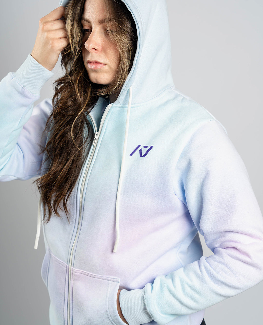 Front view of A7 Affirmation Zip Hoodie – Pastel featuring soft pastel hue and A7 logo on the left chest.