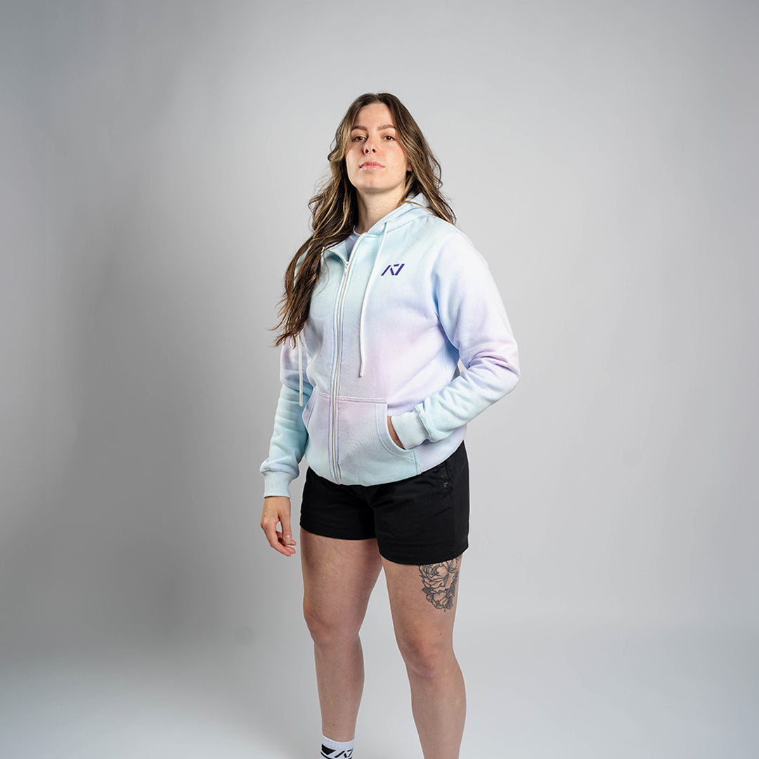 Athlete wearing the A7 Affirmation Zip Hoodie – Pastel demonstrating fit and style in a gym setting.