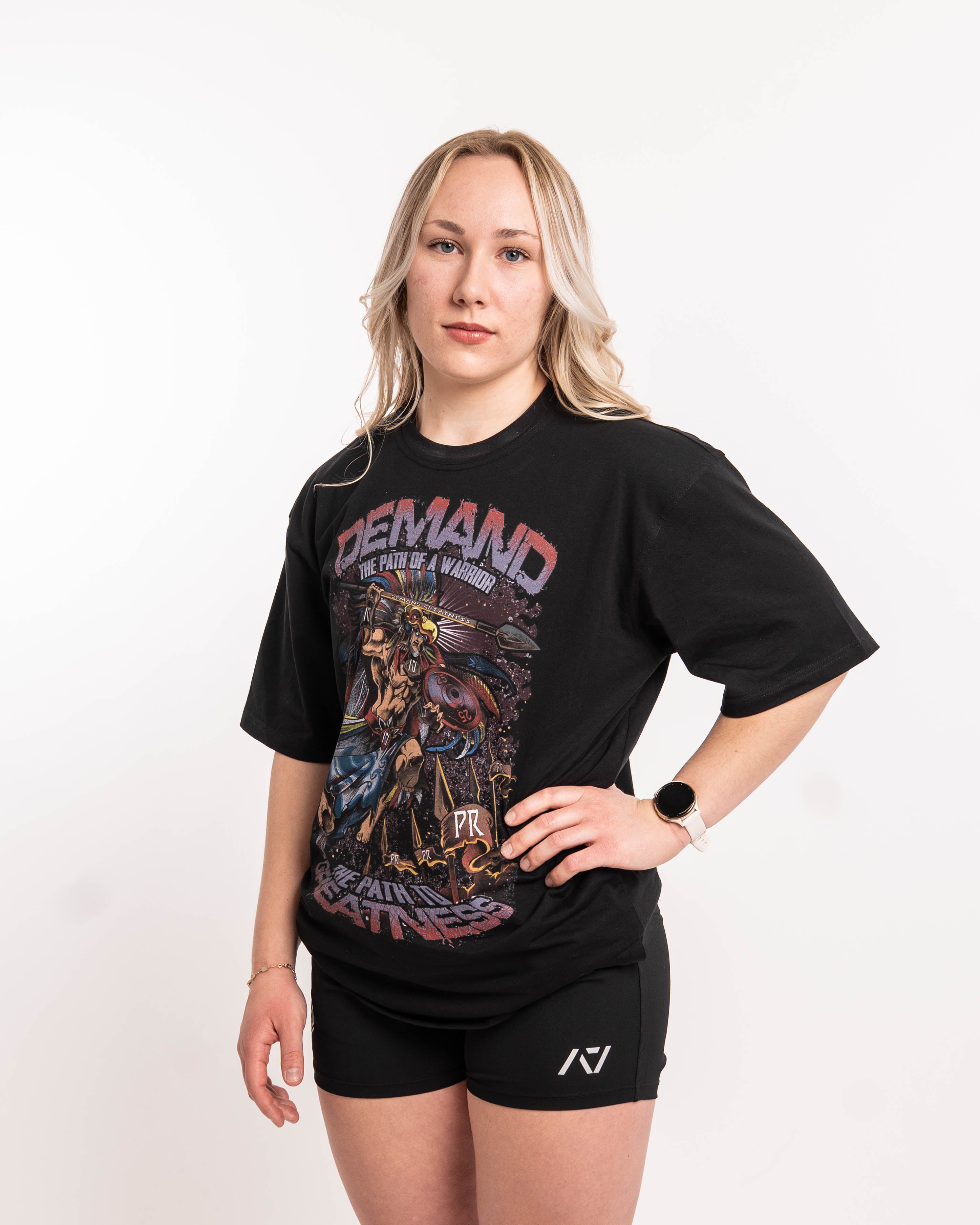 Side profile of Aztec Warrior Over-Fit Unisex Shirt demonstrating the relaxed fit and sleeve length.