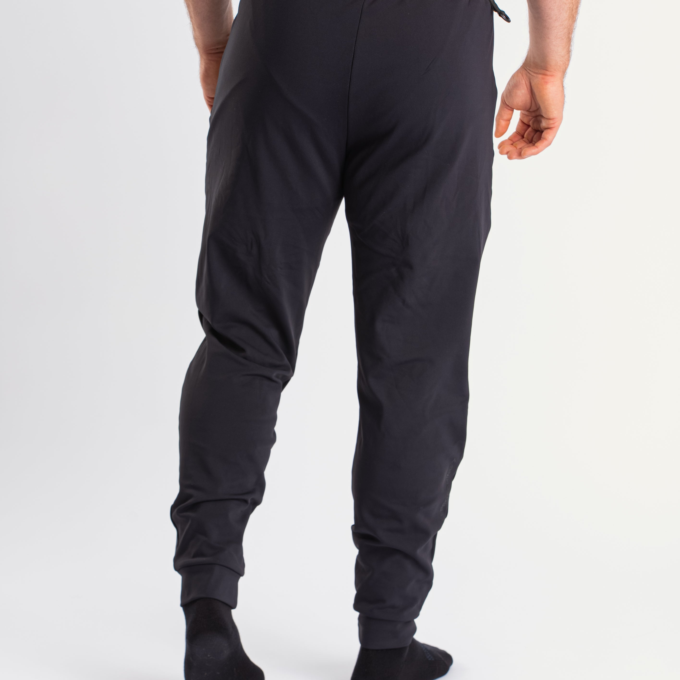 Back view of A7 Cobra 360Go 1Z Joggers in Stealth, highlighting the elastic waistband and ankle cuffs.