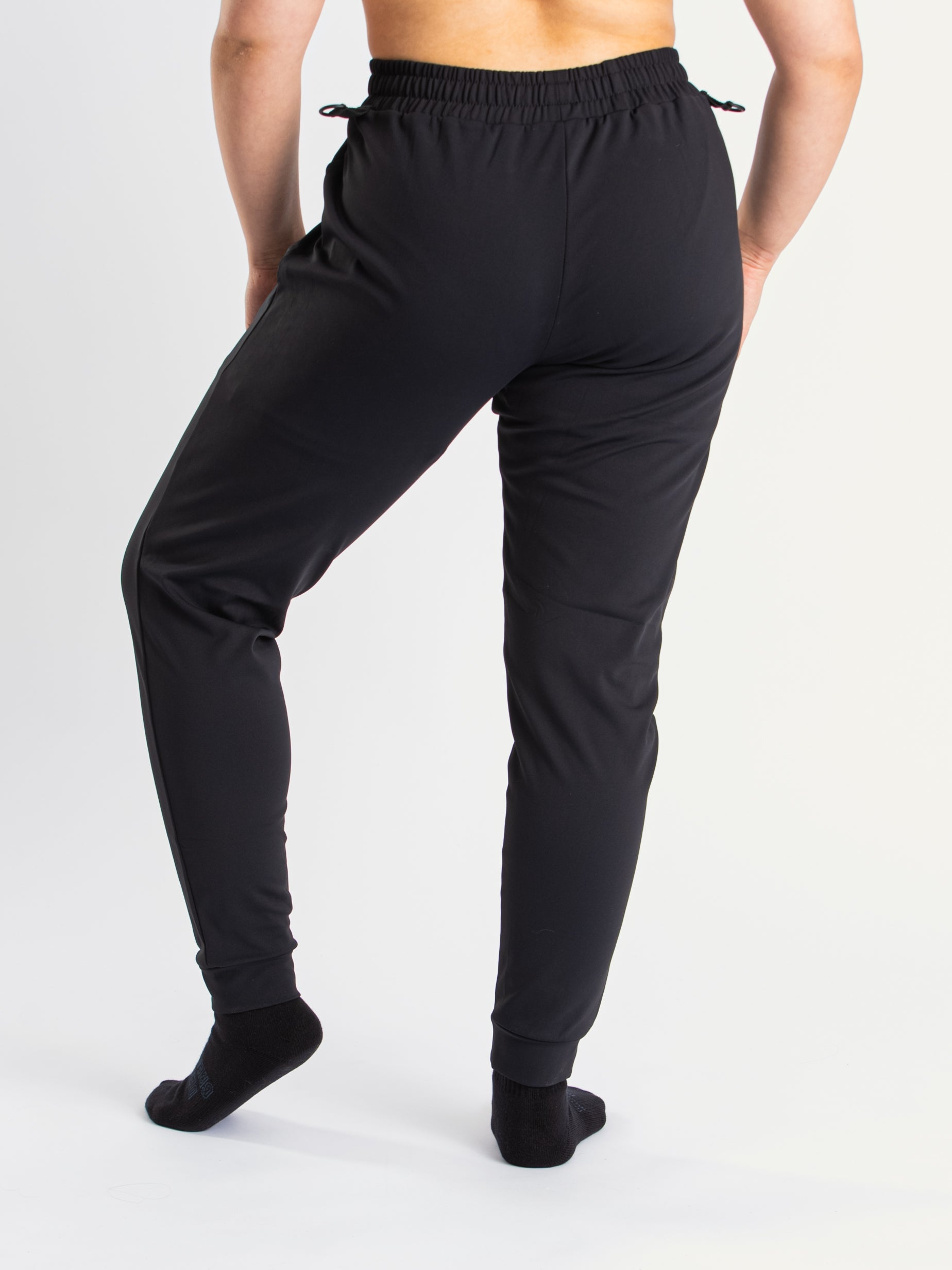 Back view of A7 Cobra 360Go 1Z Joggers in Stealth, highlighting the elastic waistband and ankle cuffs