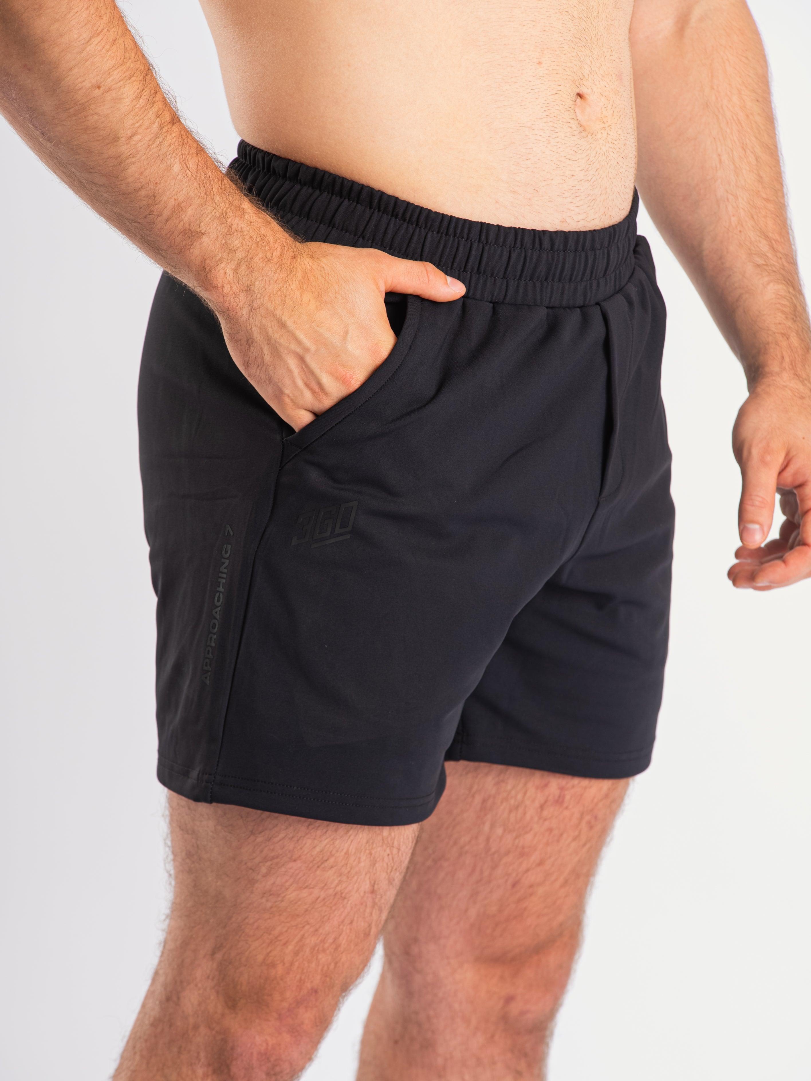 Front view of A7 Cobra 360Go 1Z Shorts in Stealth, showcasing the sleek design and tapered leg fit.