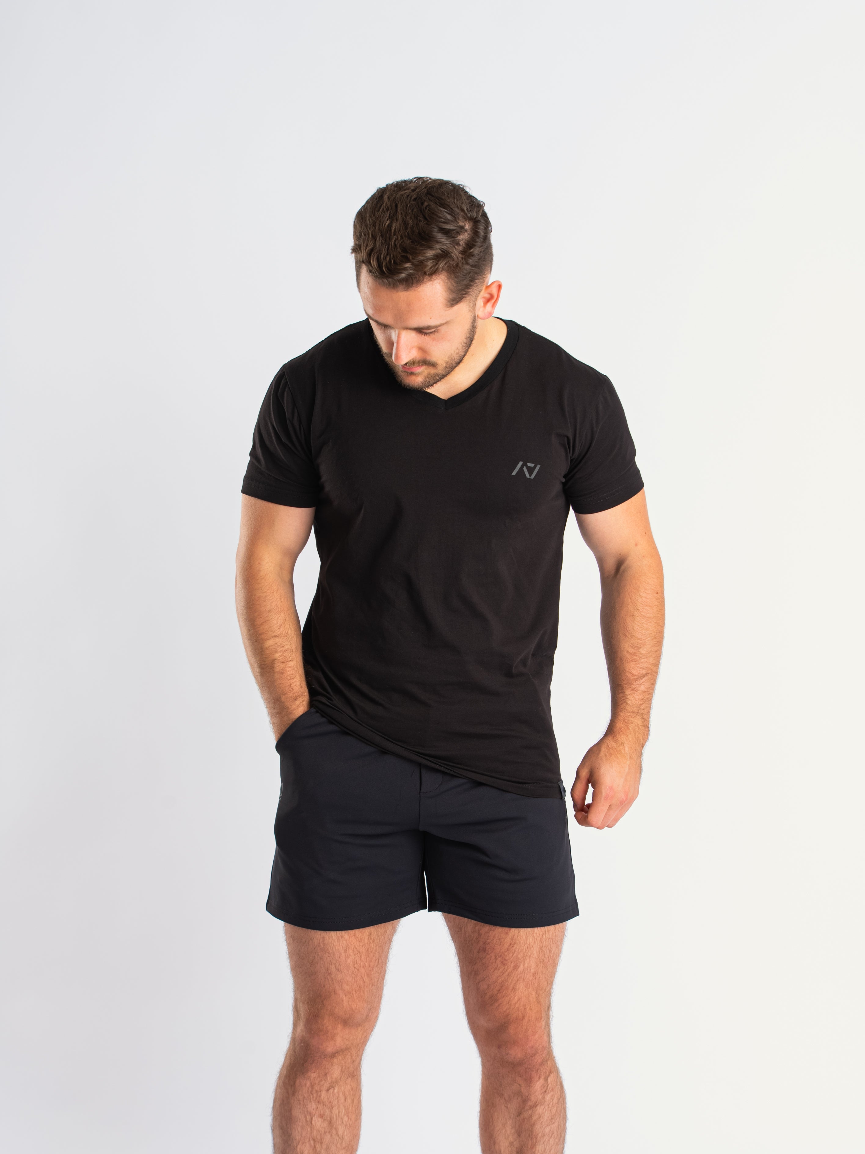 Athlete wearing the A7 Cobra 360Go 1Z Shorts in Stealth, demonstrating fit and style in a gym setting.