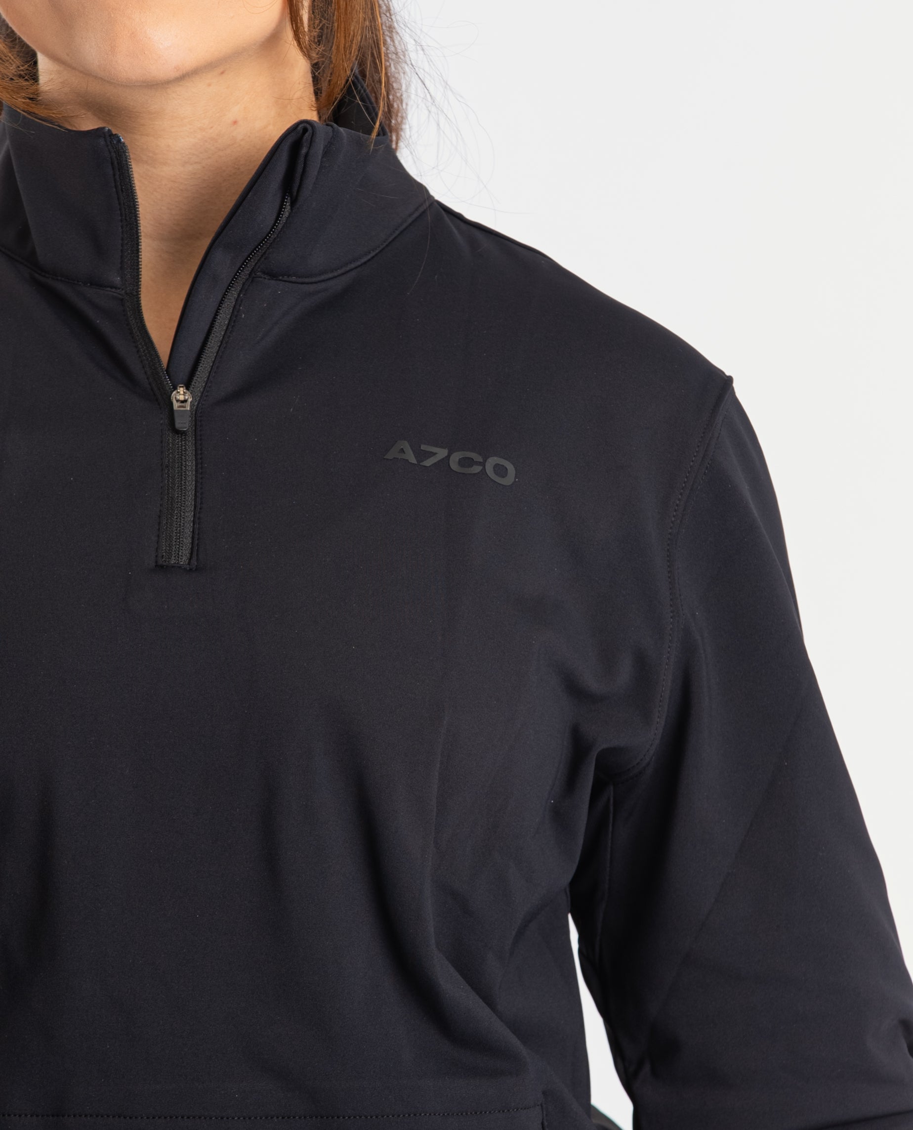 Close-up of the soft 4-way-stretch fabric of the A7 Cobra Quarter Zip Jacket in Stealth, emphasizing comfort and flexibility