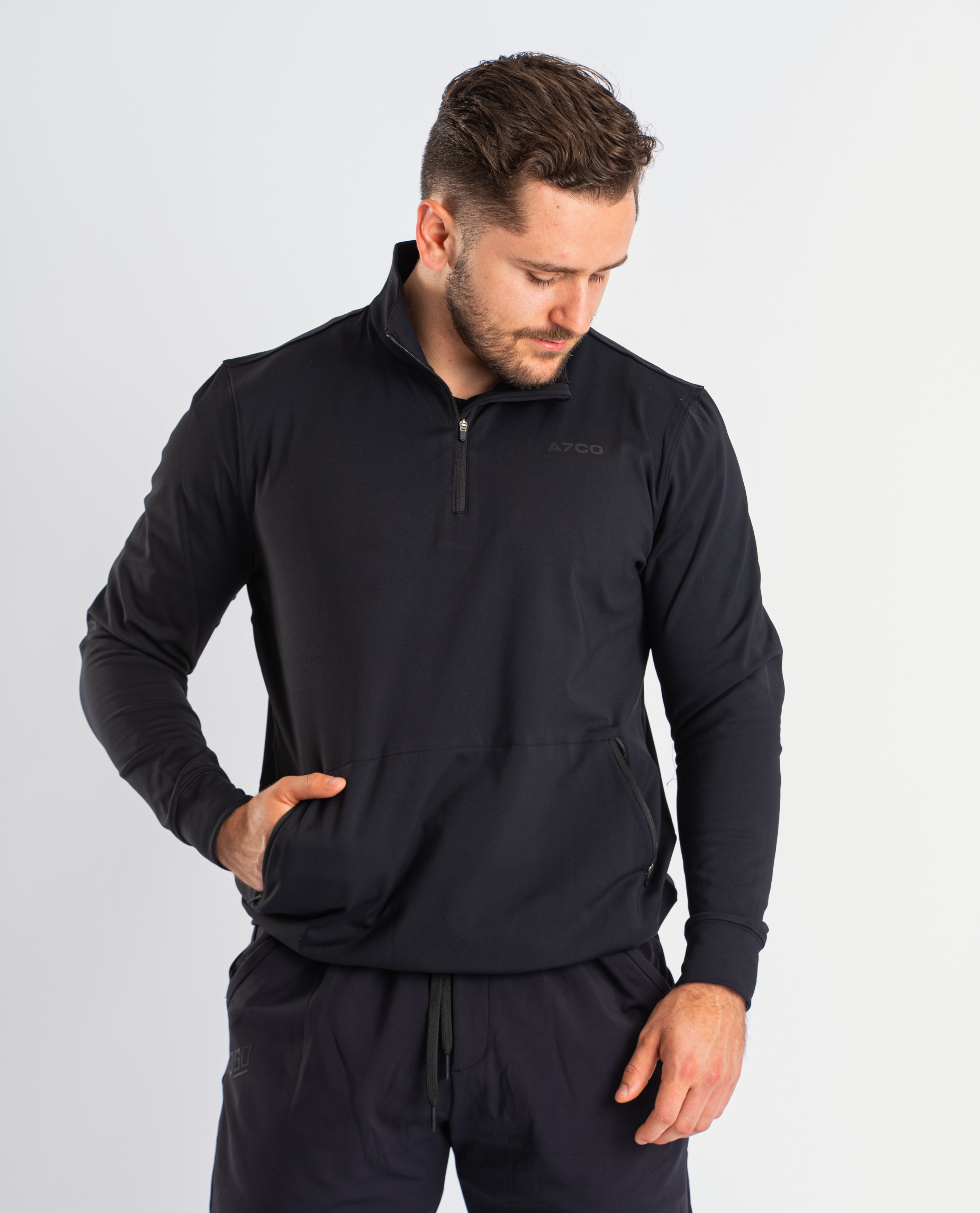 Front view of A7 Cobra Quarter Zip Jacket in Stealth, showcasing the sleek design and quarter zip feature.