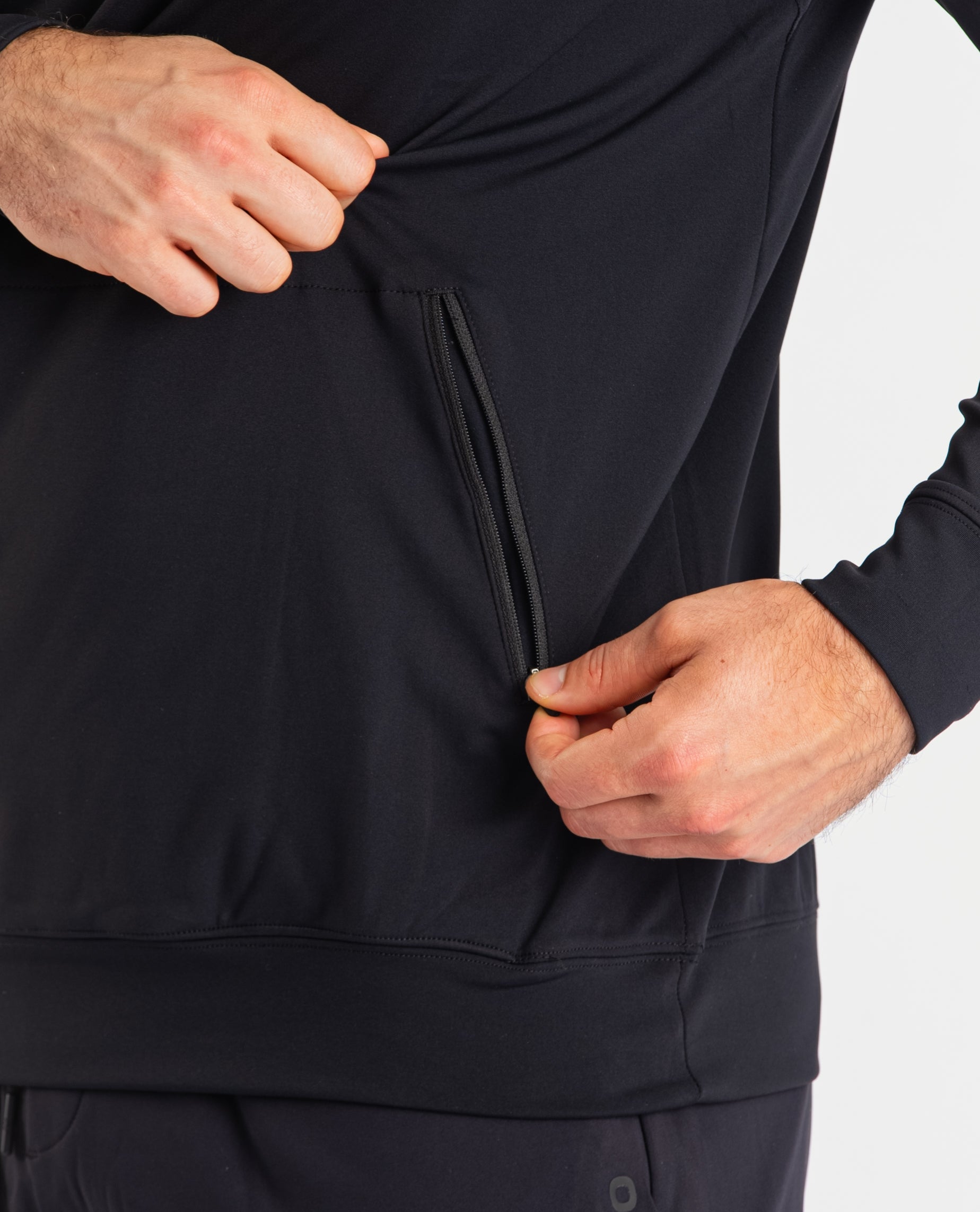 Close-up of the zippered pocket on the A7 Cobra Quarter Zip Jacket – Stealth, designed for secure storage with a clean, minimalist finish.