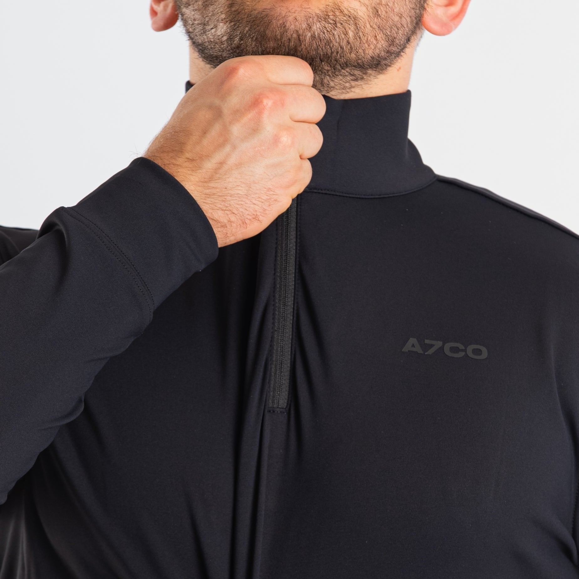 Close-up of the YKK quarter zipper on the A7 Cobra Quarter Zip Jacket – Stealth, highlighting durable construction and clean collar finish.