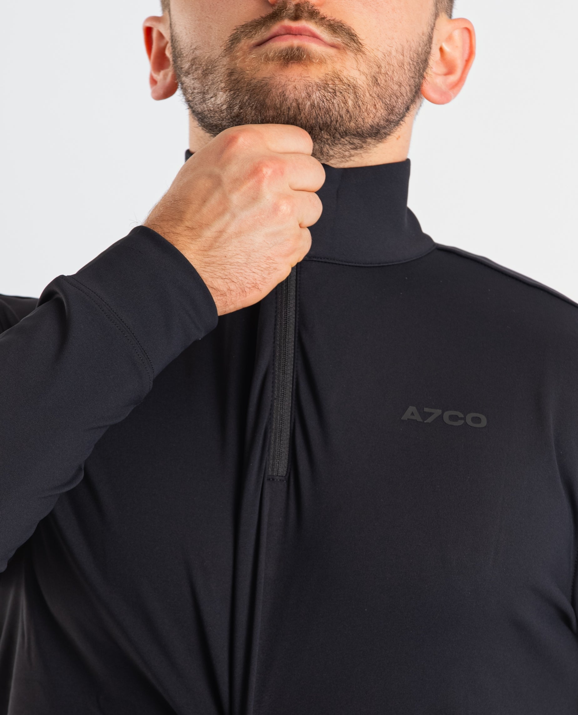 Close-up of the YKK quarter zipper on the A7 Cobra Quarter Zip Jacket – Stealth, highlighting durable construction and clean collar finish.