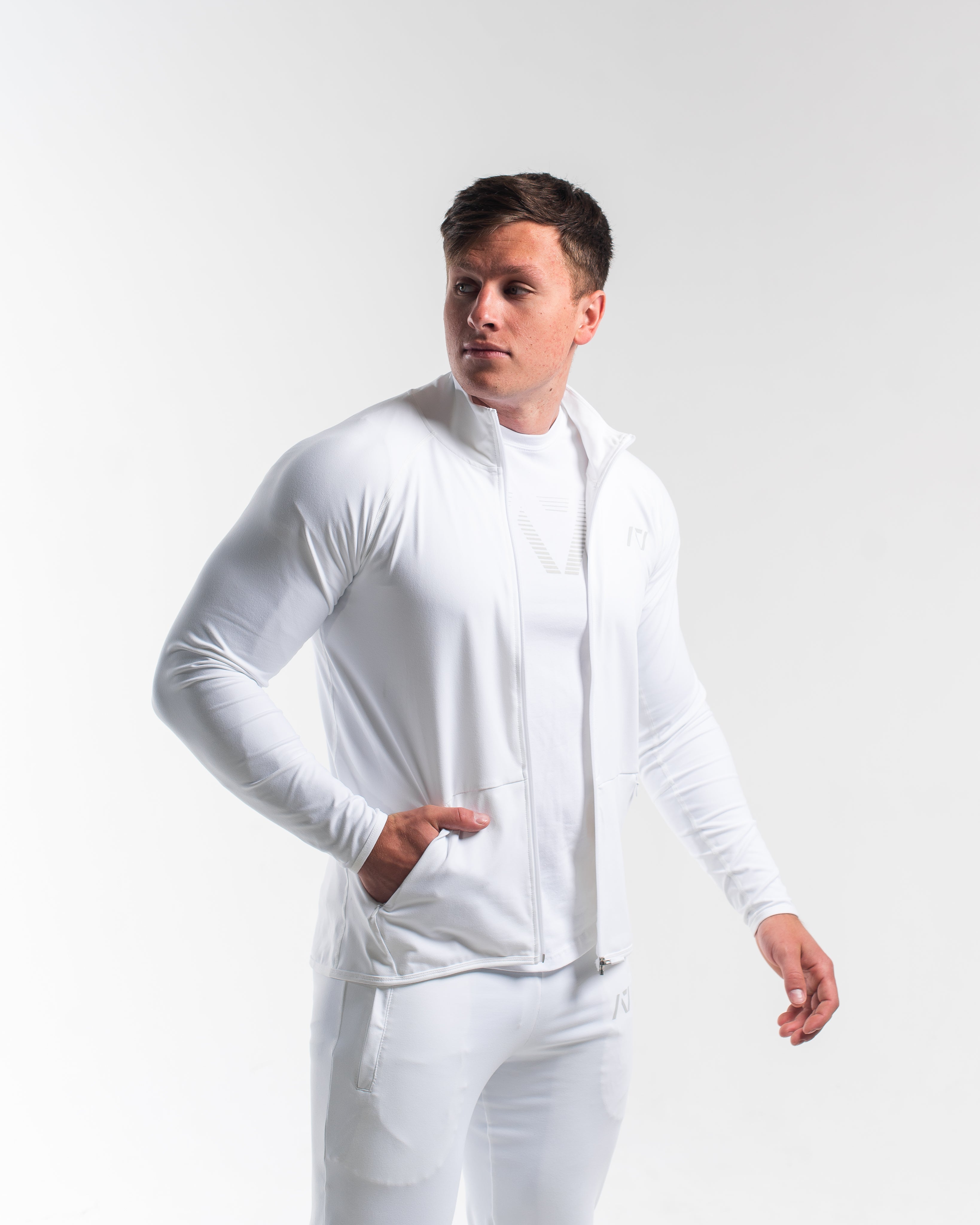 Front view of the Defy Jacket – Polar, showing tapered fit and full zip.