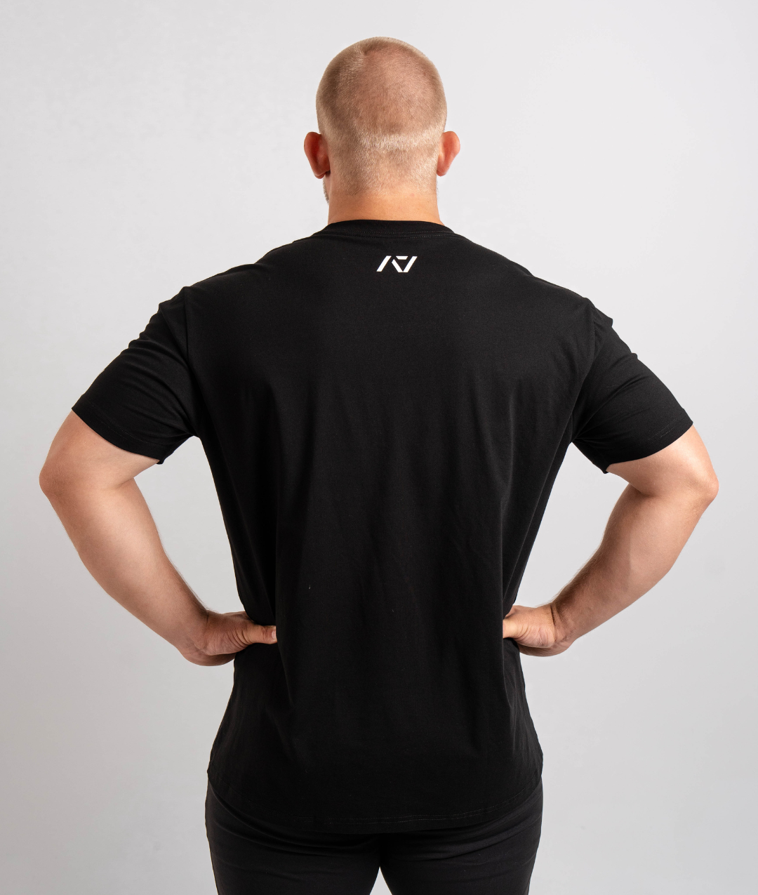 Back view highlighting A7 logo printed below the neckline on the Domino shirt.