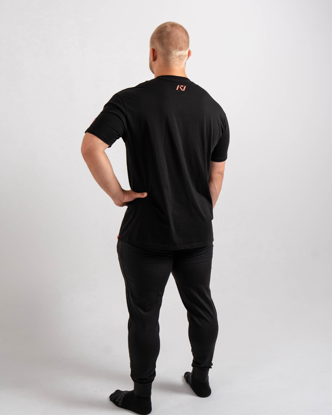 Back view showing A7 logo centered below the neckline on the Flamingo shirt.