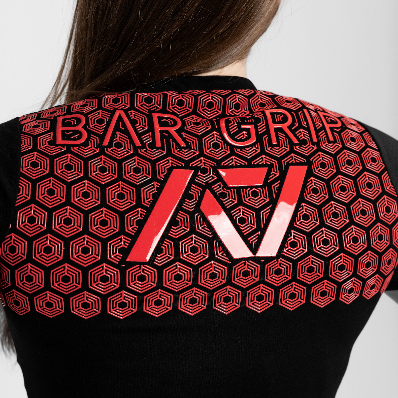 Close up of bar grip on fire bar grip womens shirt