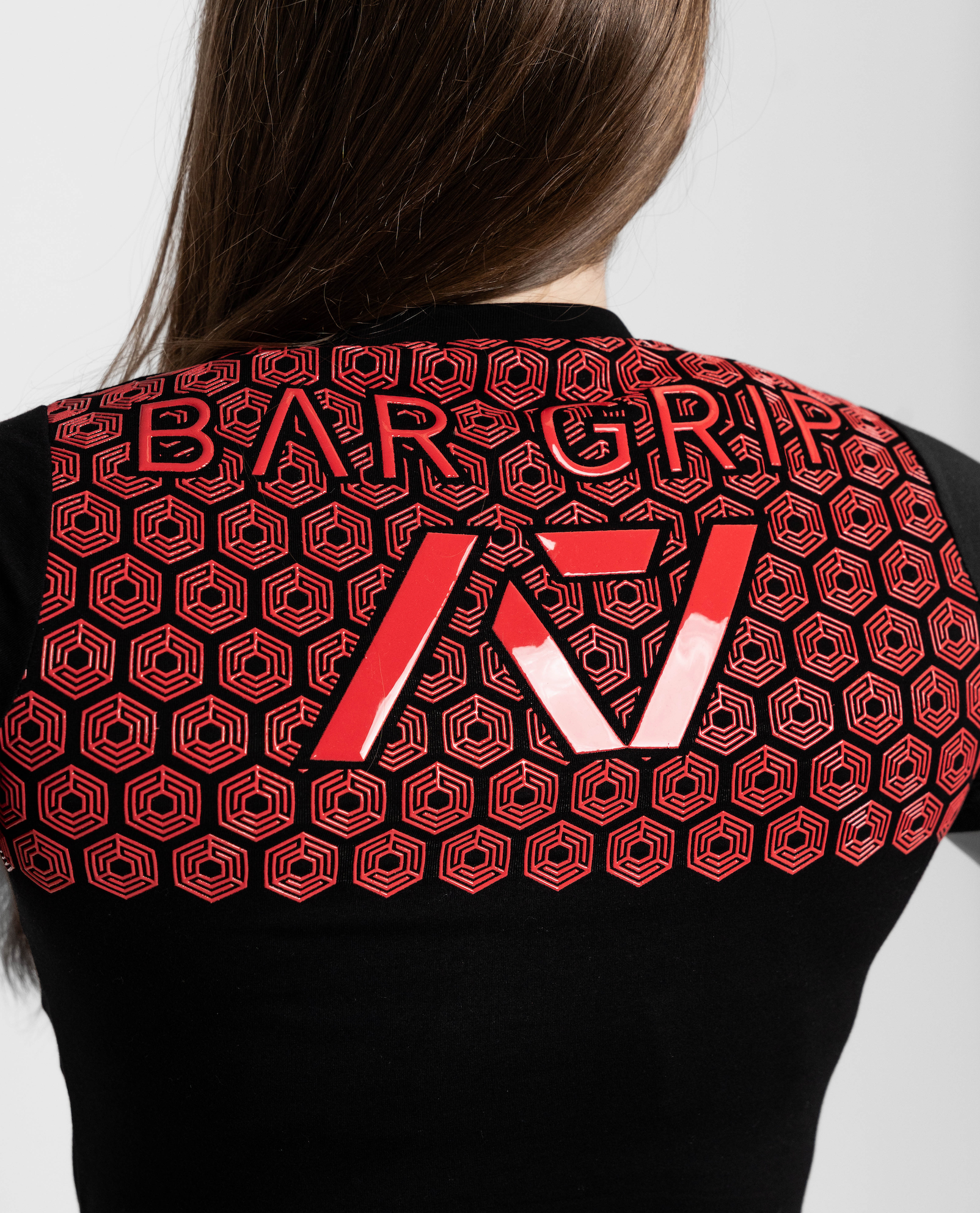 Close up of bar grip on fire bar grip womens shirt