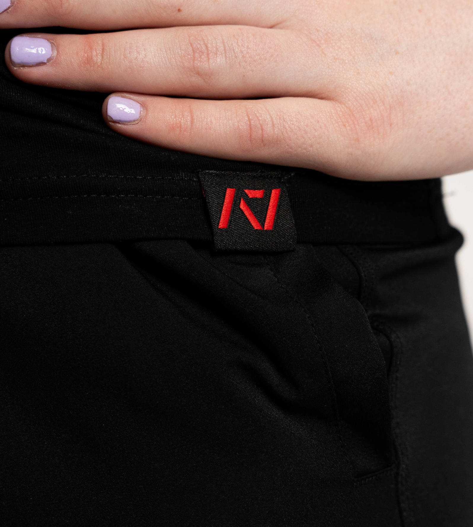 fire bar grip womens shirt with hem tag on model