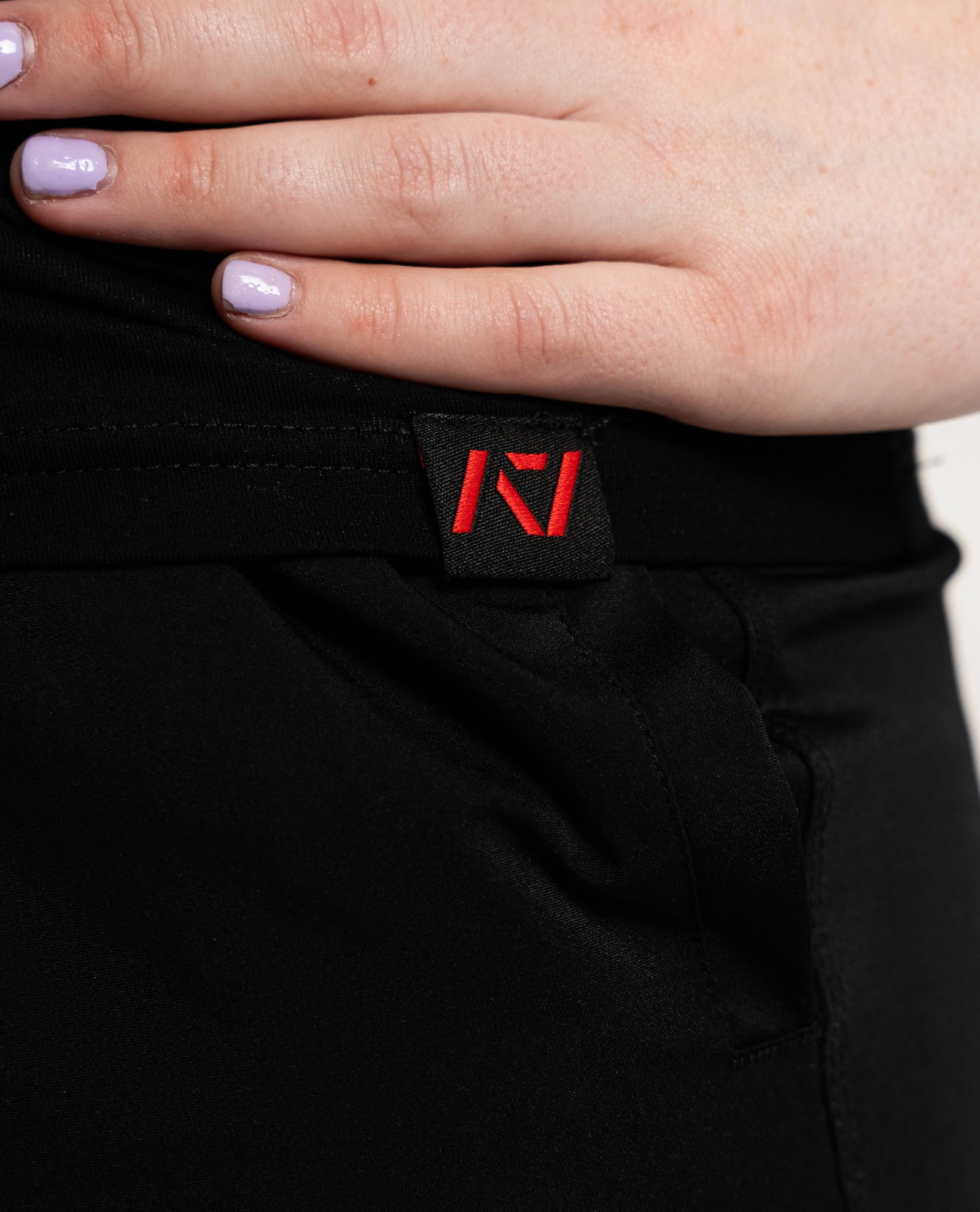 fire bar grip womens shirt with hem tag on model