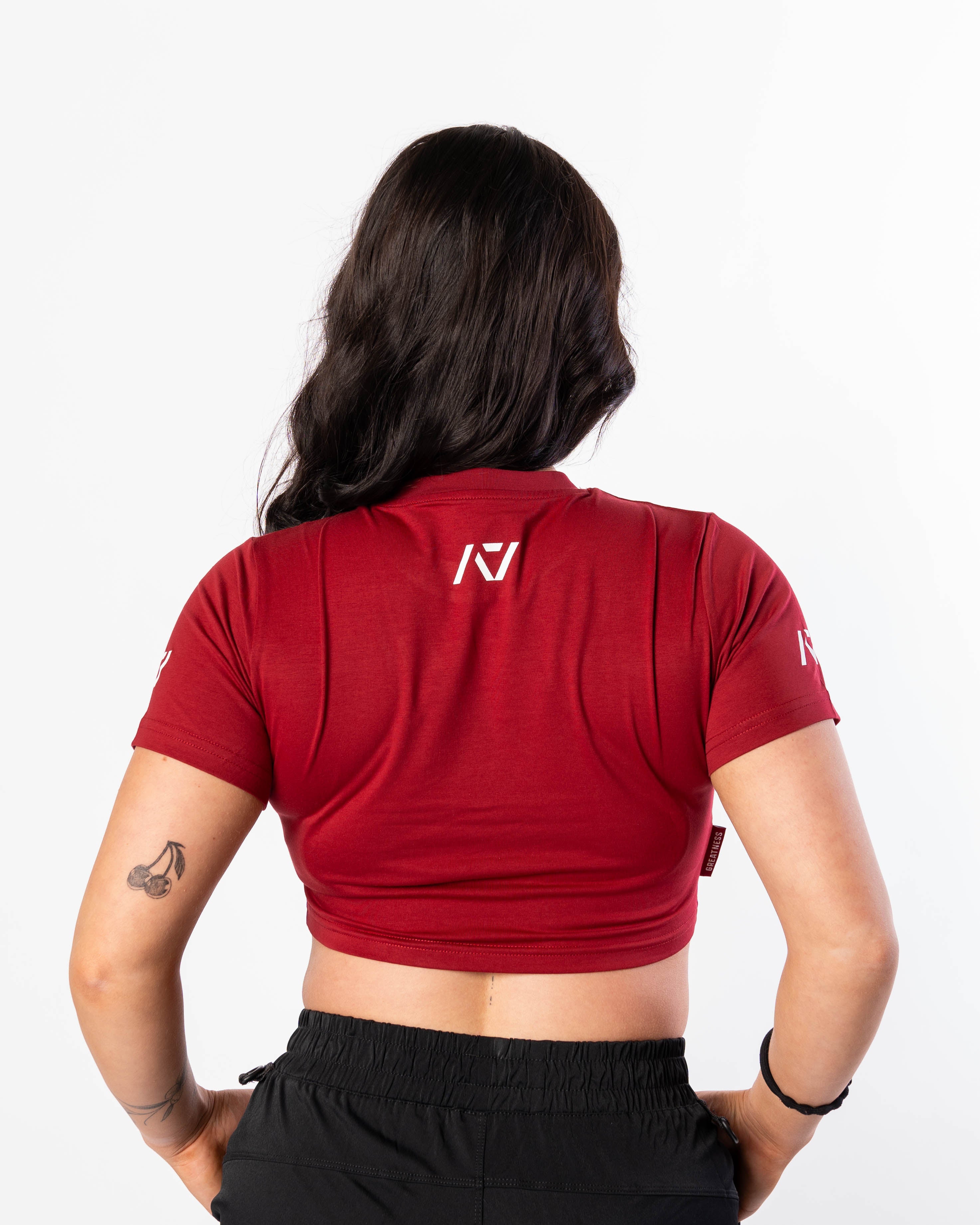 Showcasing back of Ivory Rose Crop Top with A7 logo on upper back