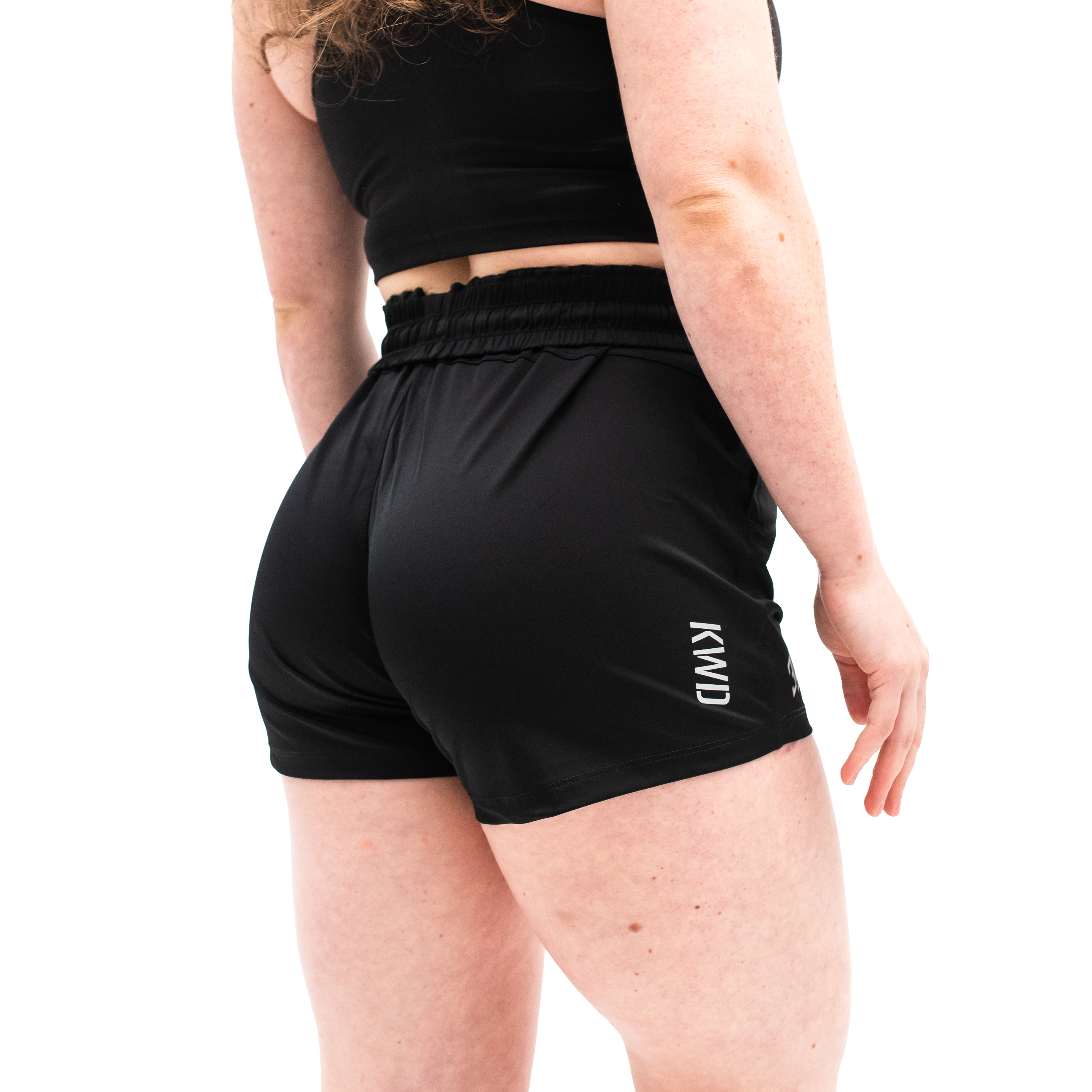 Rear view of A7 360Go KWD Shorts in Black featuring ripstop loop-through pockets and functional silhouette.