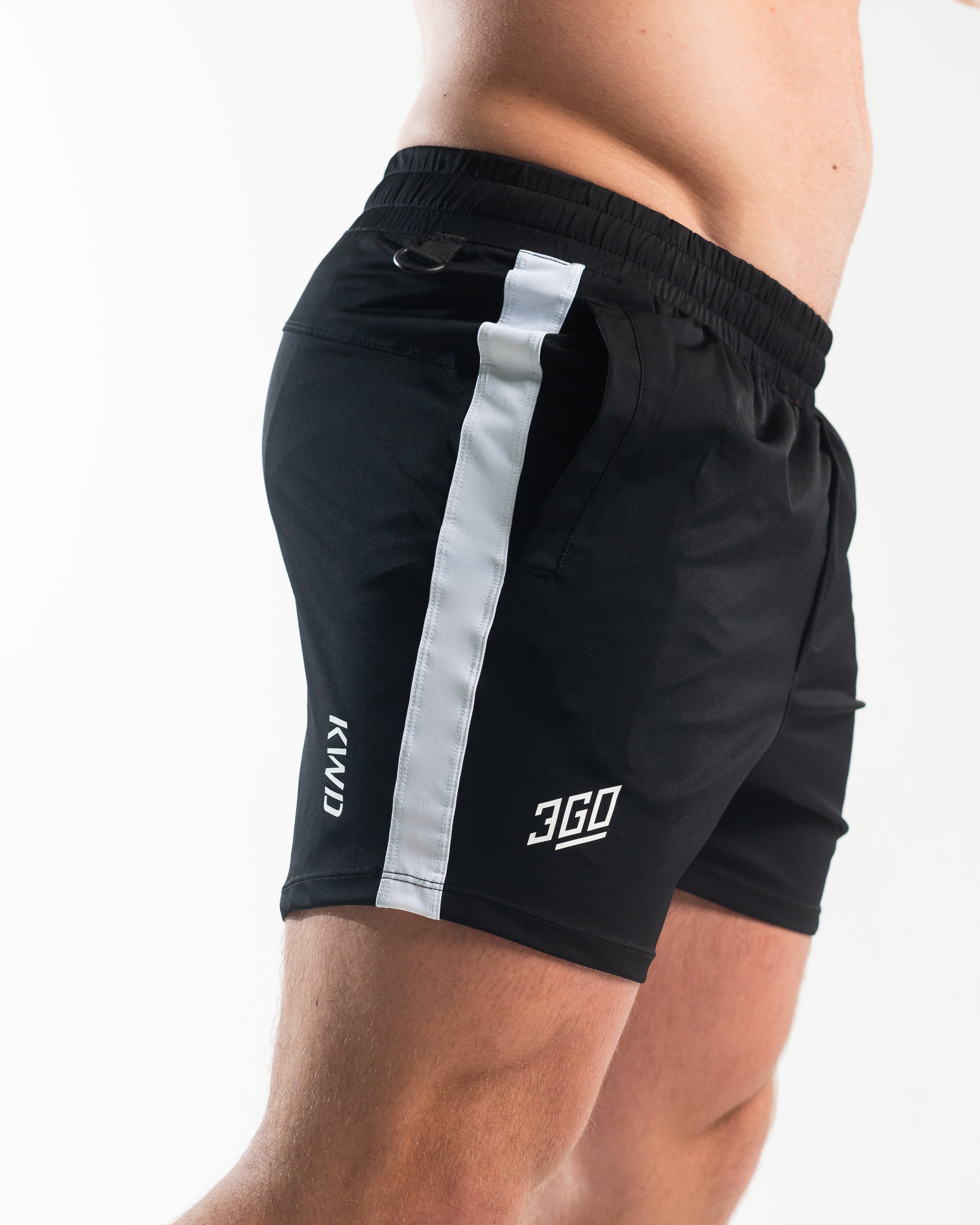 Side profile of Domino 360Go KWD Shorts highlighting the shorter inseam cut and flexible stretch material.
