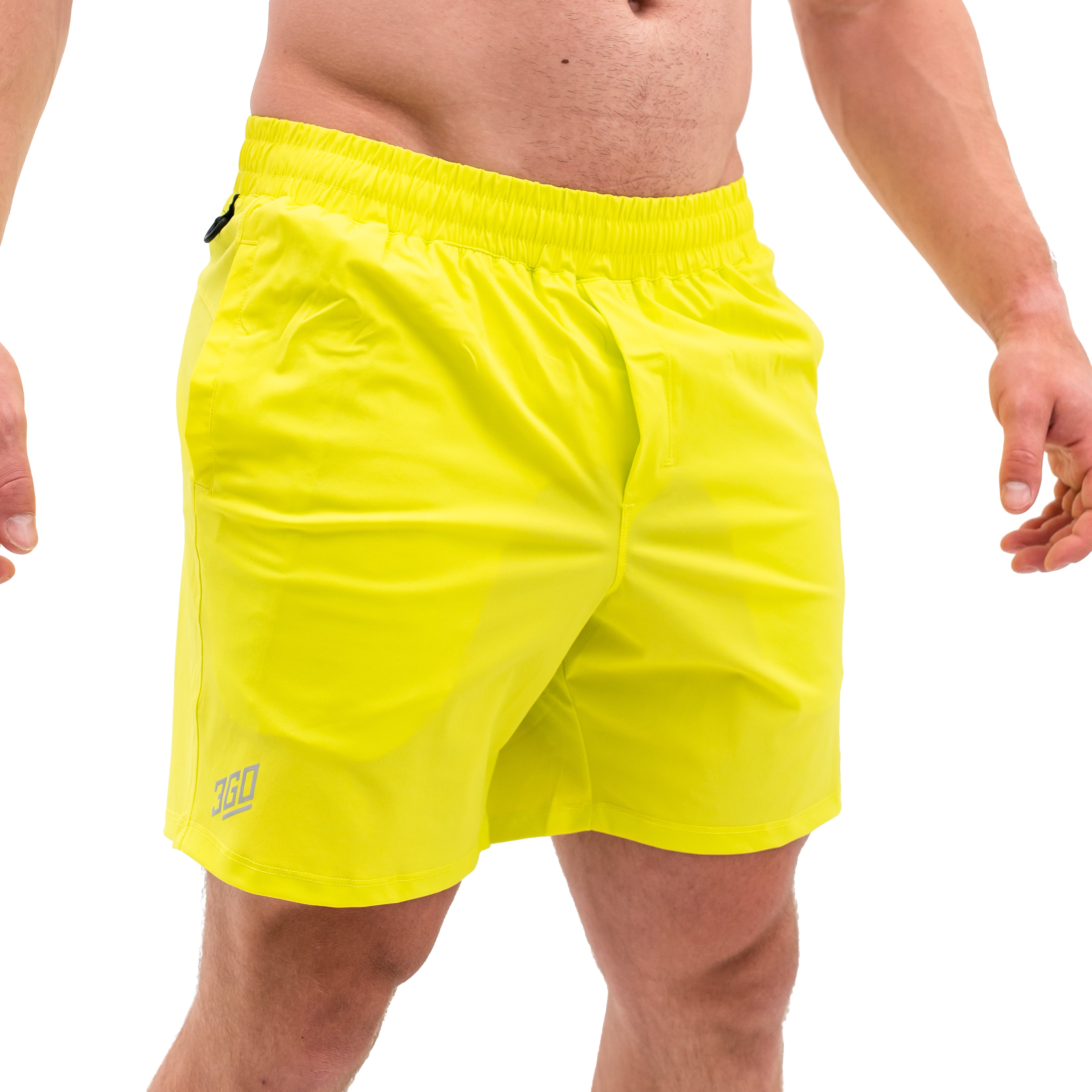 Front view of A7 360Go Shorts in Electric Lemonade, featuring neon yellow color, Regular inseam, and wide waistband.