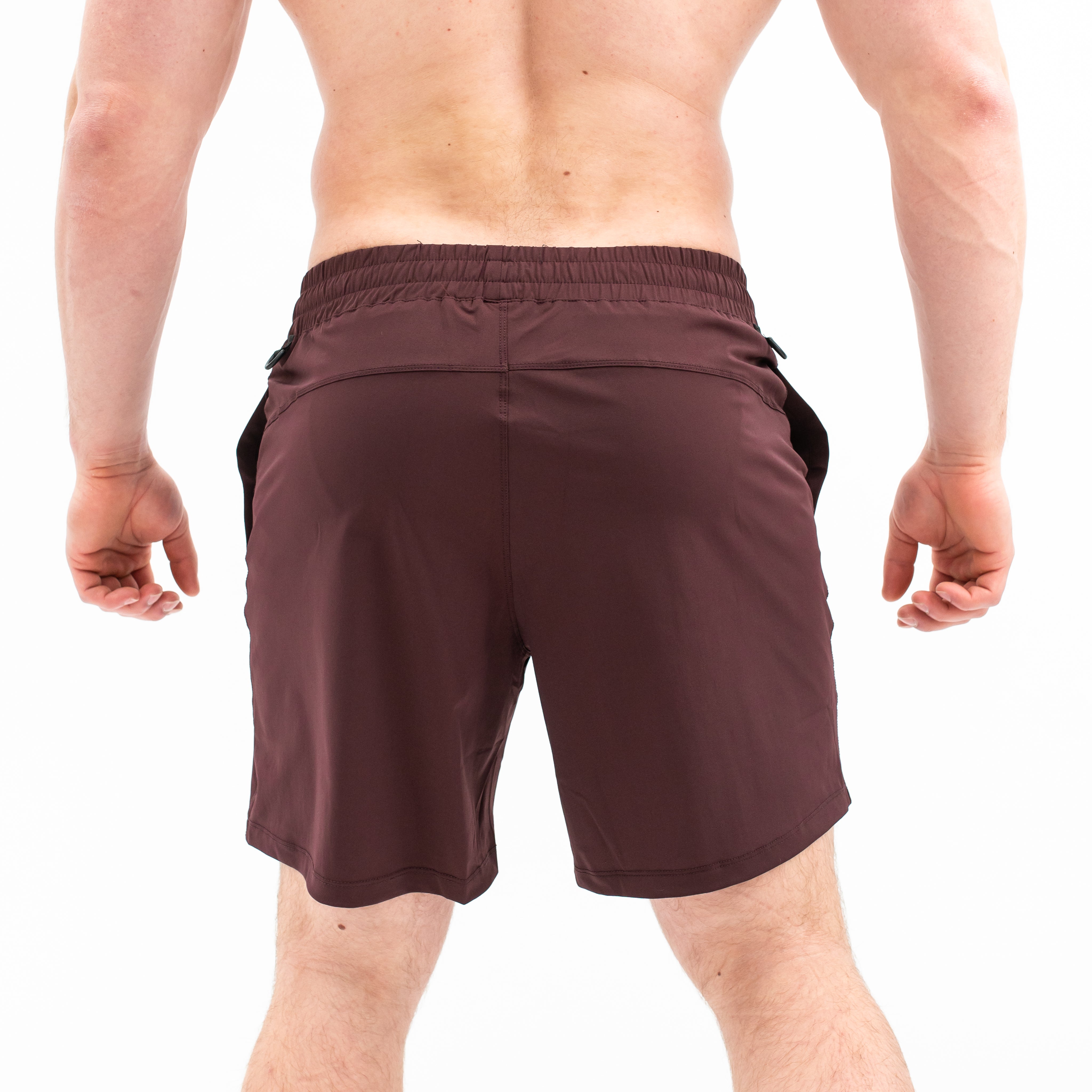 Rear view of A7 Mahogany 360Go Shorts with loop-through ripstop pockets and minimalist athletic silhouette.