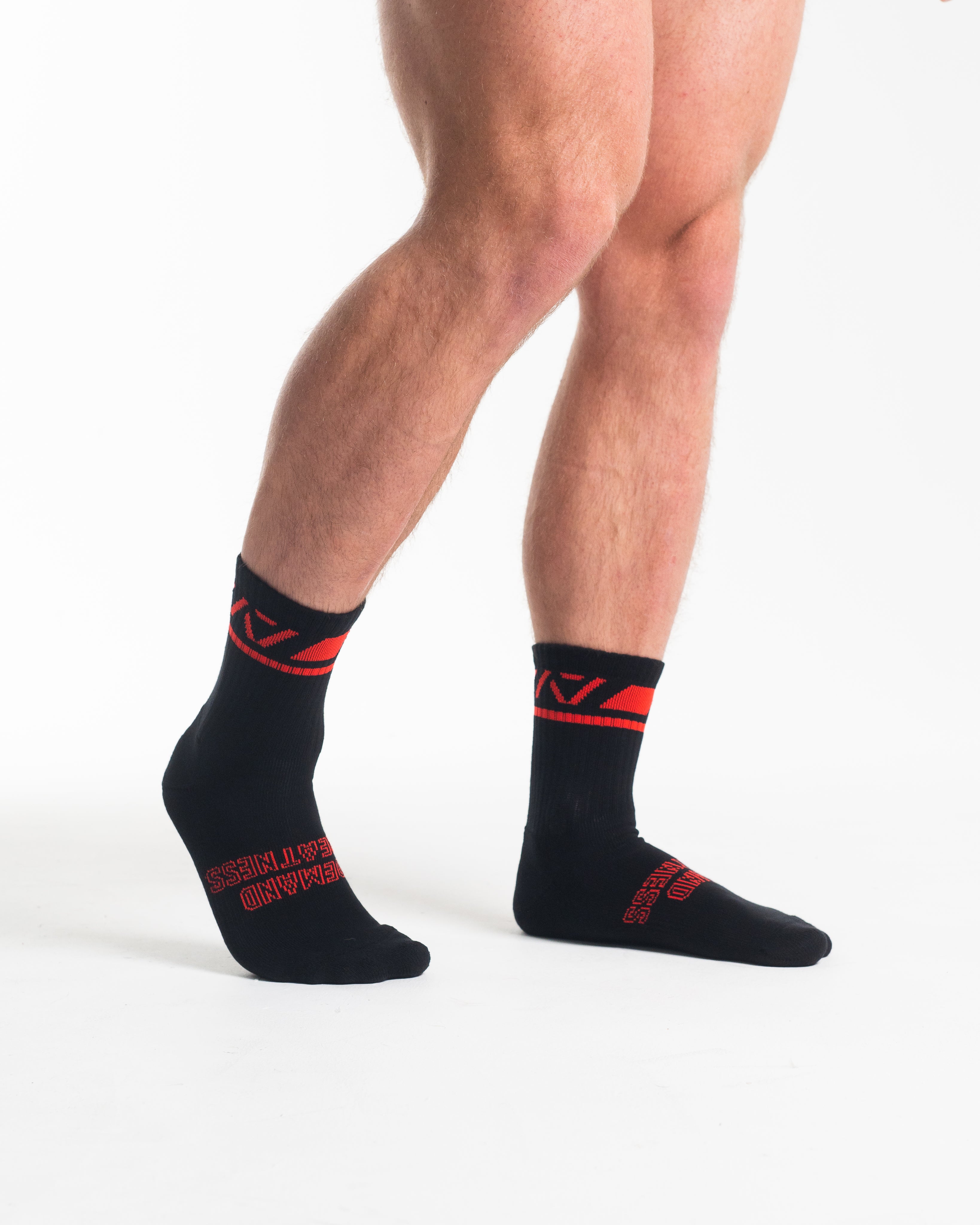 Side profile of A7 Crew Socks in Red Dawn, highlighting the A7 logo on the ankle and compression-style top.