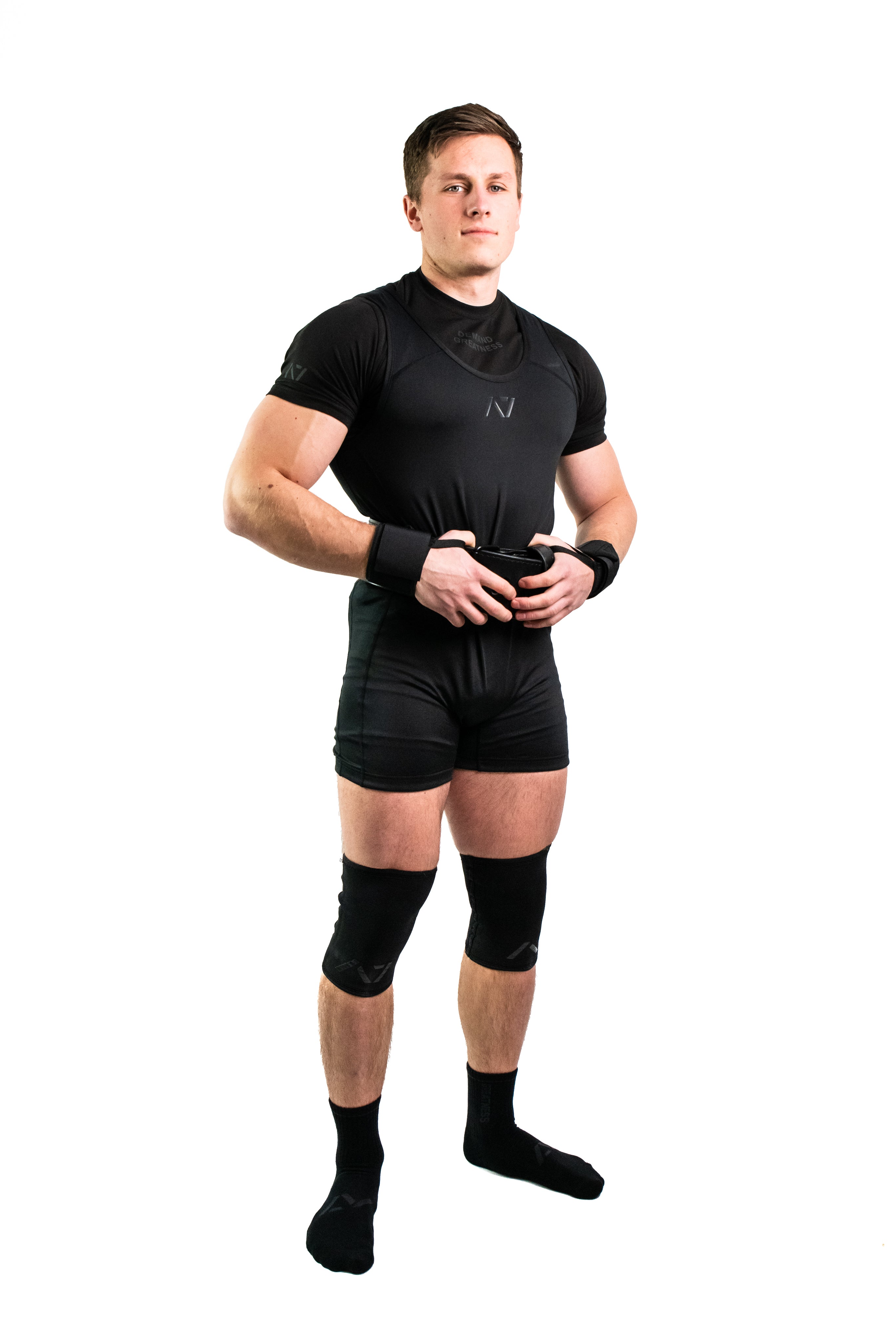 Athlete wearing A7 Classic Singlet – Stealth, demonstrating full coverage fit and performance-focused design.