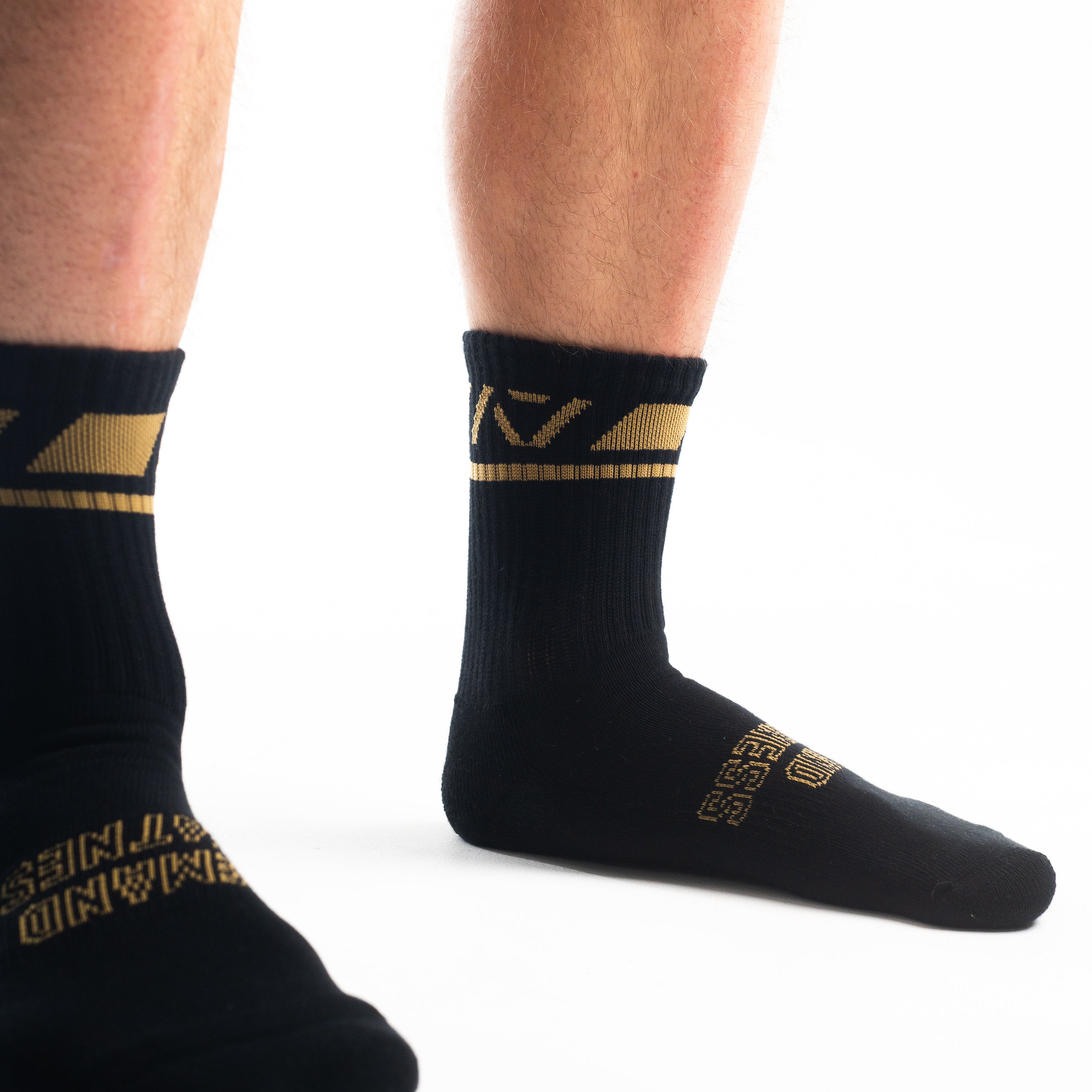 Close-up of the knit fabric on A7 Crew Socks in Gold Standard, showing texture and stitching details.
