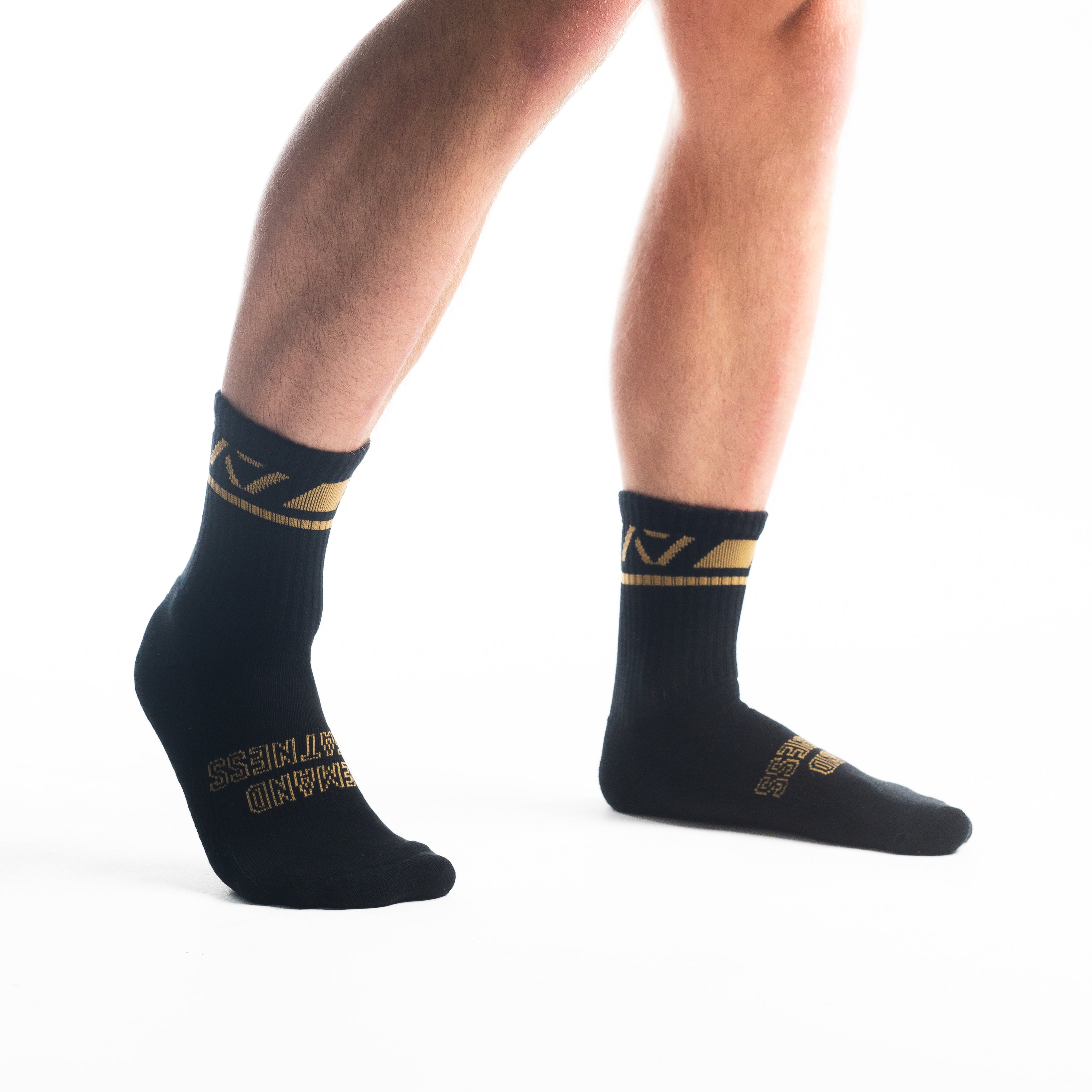 Front view of A7 Crew Socks in Gold Standard, showcasing mid-shin length and ribbed cuff design.