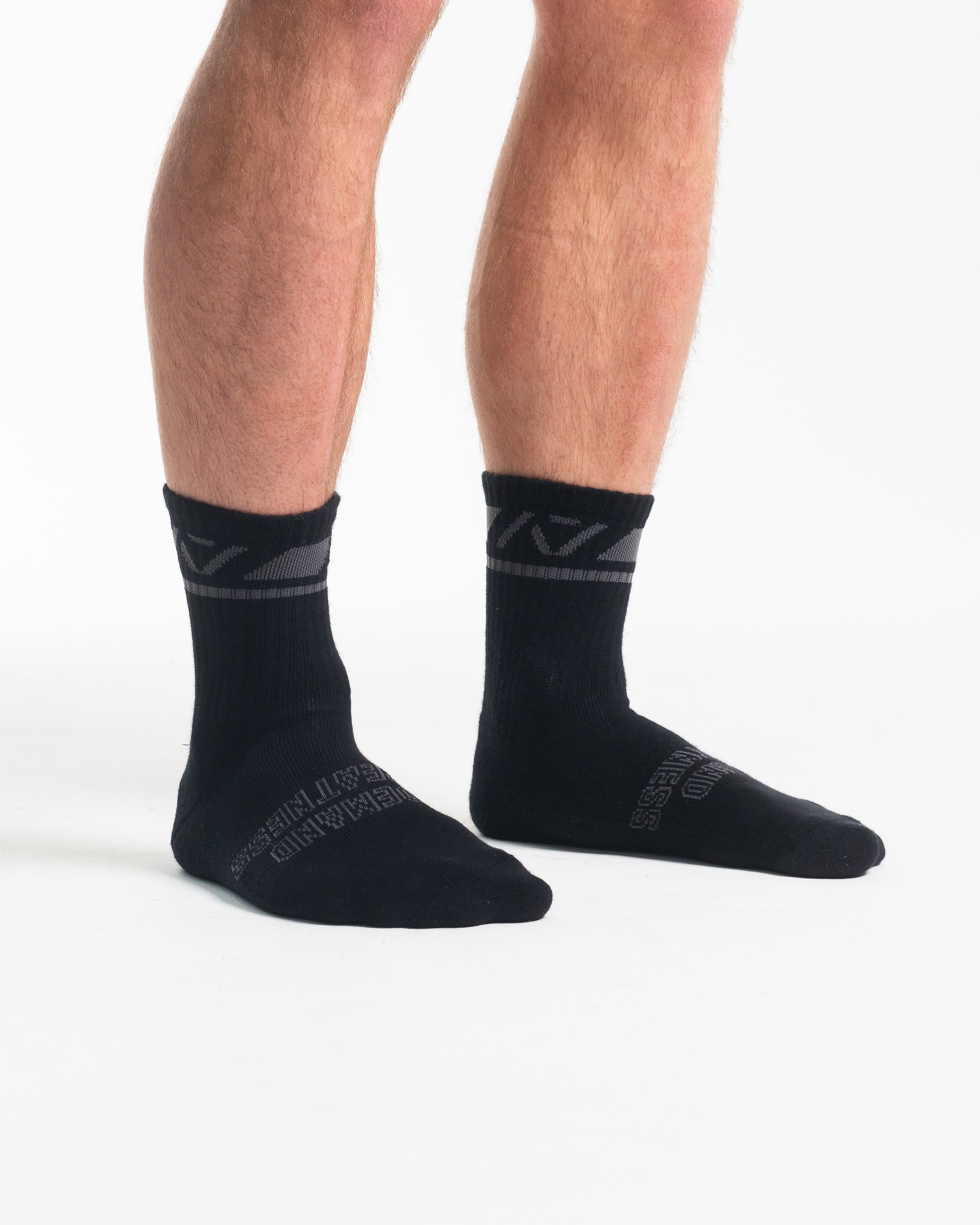Side profile of A7 Crew Socks in Shadow Stone, highlighting the A7 logo on the ankle and compression-style top.