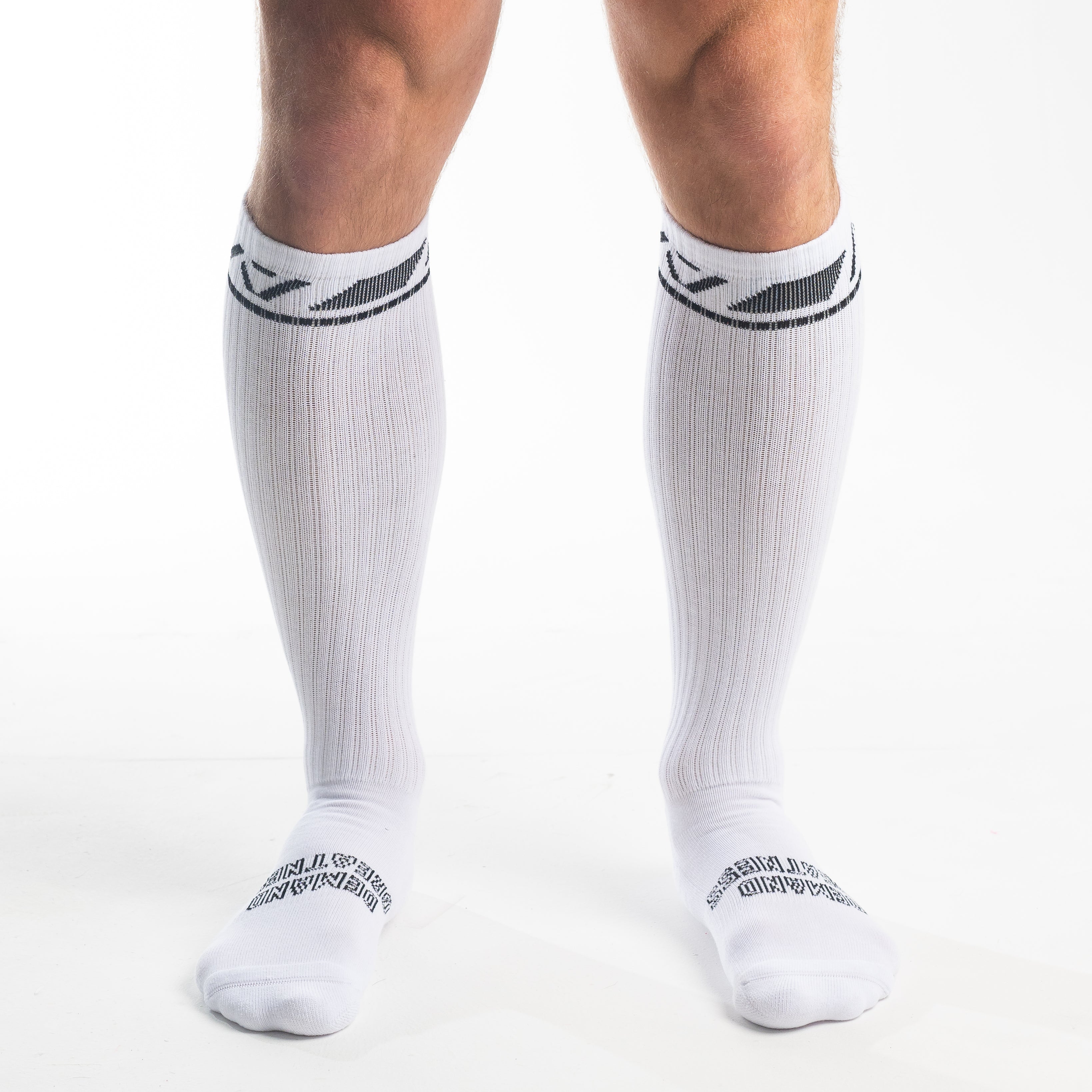 Front view of A7 Deadlift Socks in Domino White, showcasing knee-high length and ribbed cuff design.