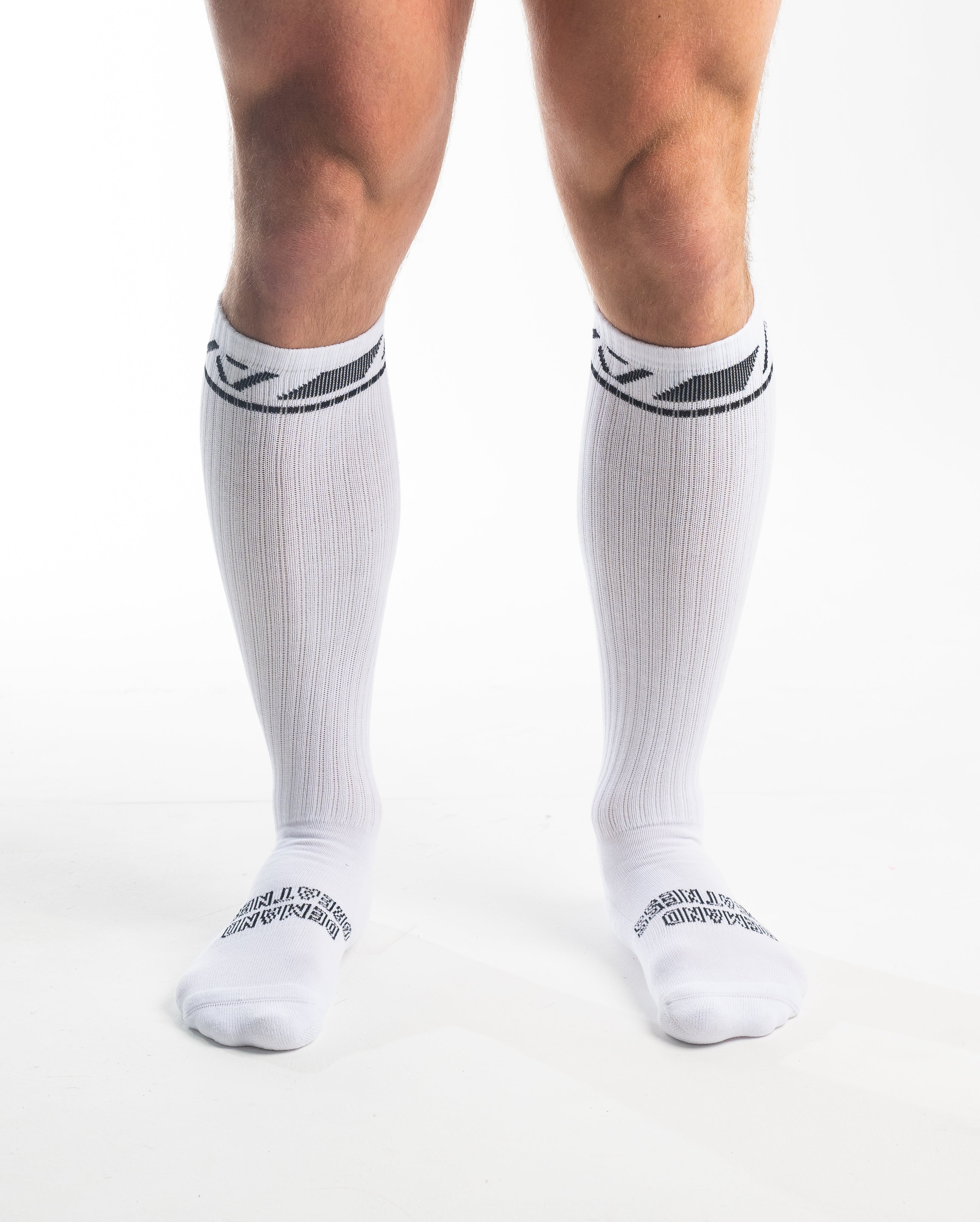 Front view of A7 Deadlift Socks in Domino White, showcasing knee-high length and ribbed cuff design.