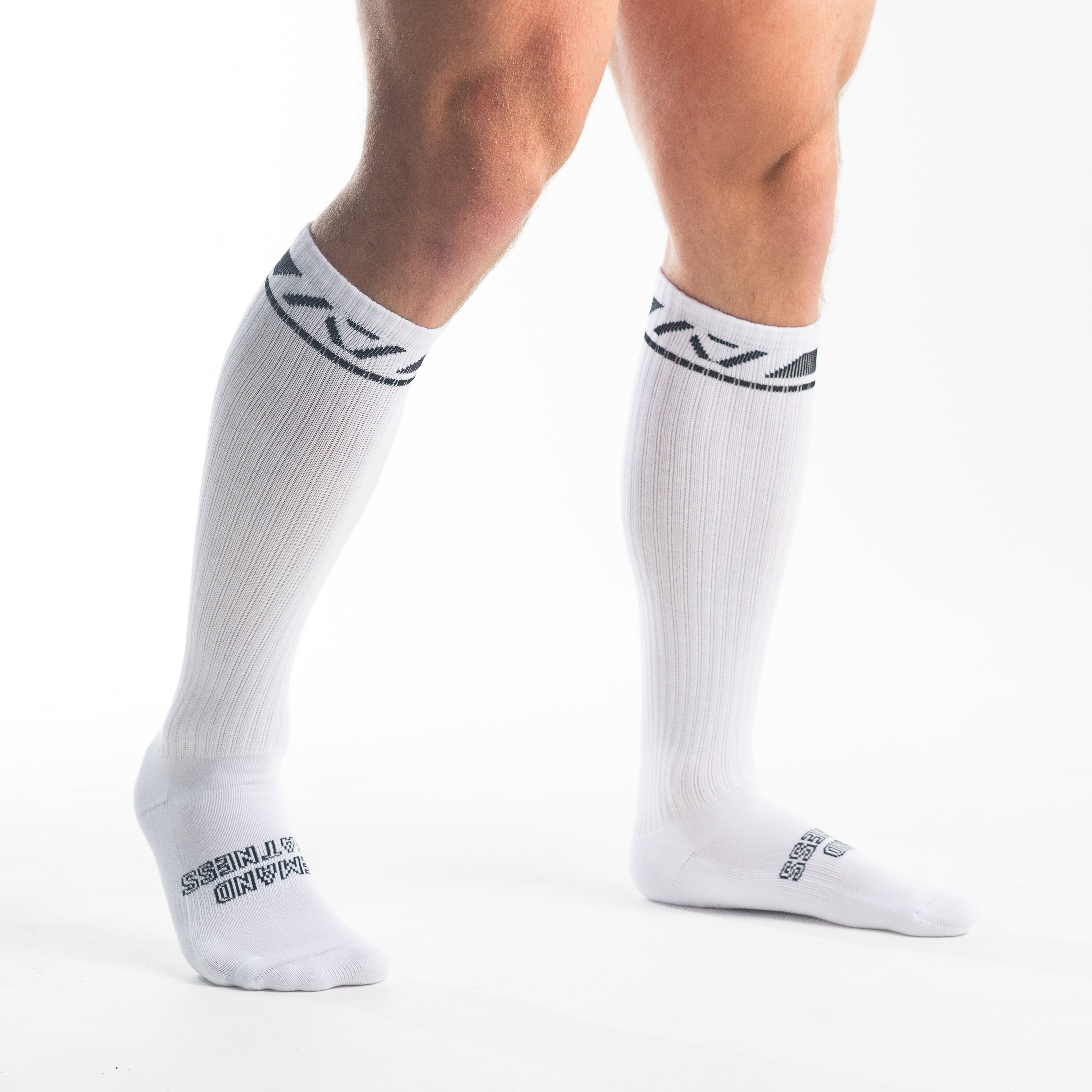 Side profile of A7 Deadlift Socks in Domino White, highlighting the A7 logo on the ankle and compression-style top.