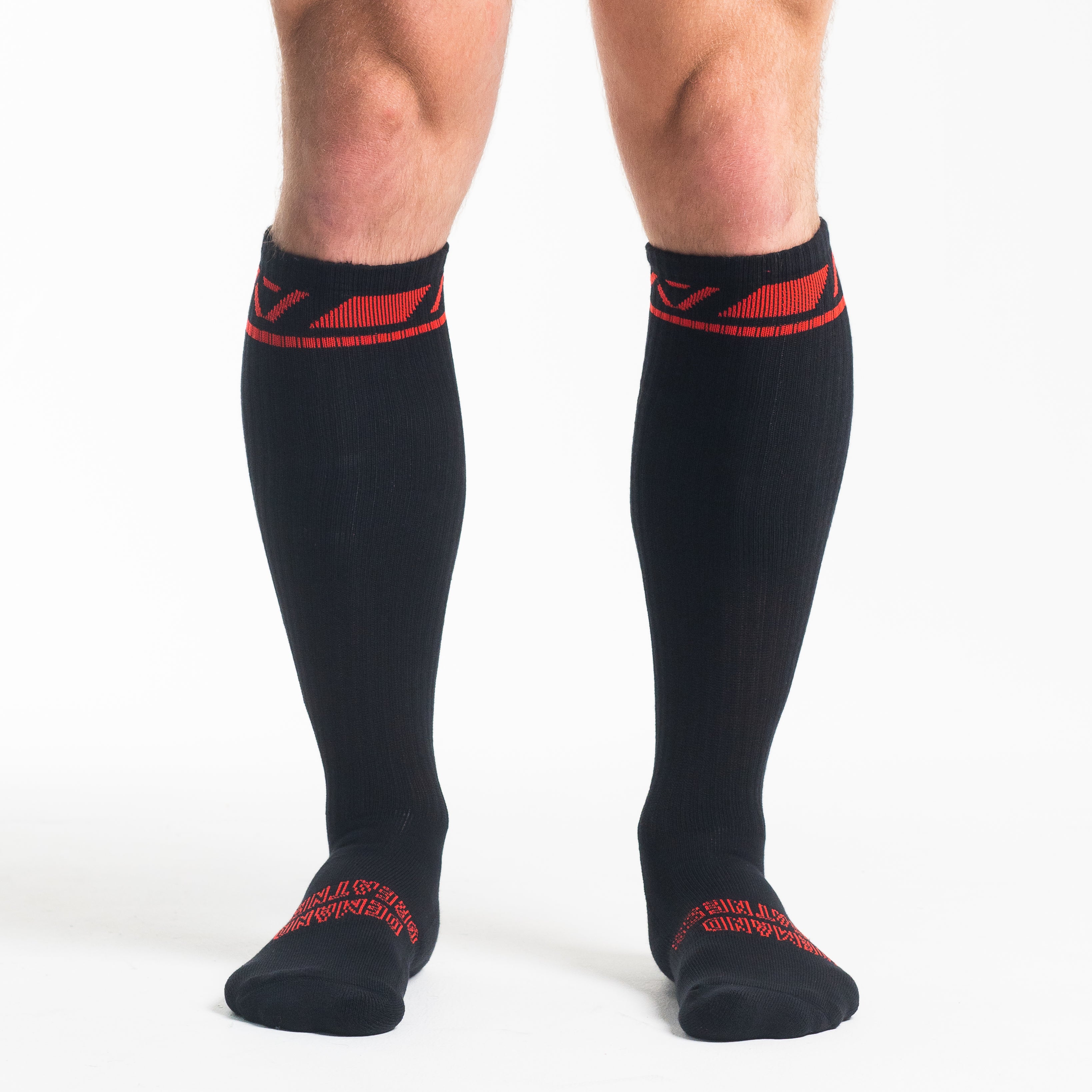 Front view of A7 Deadlift Socks – Red Dawn, displaying knee‑high length and ribbed cuff design.