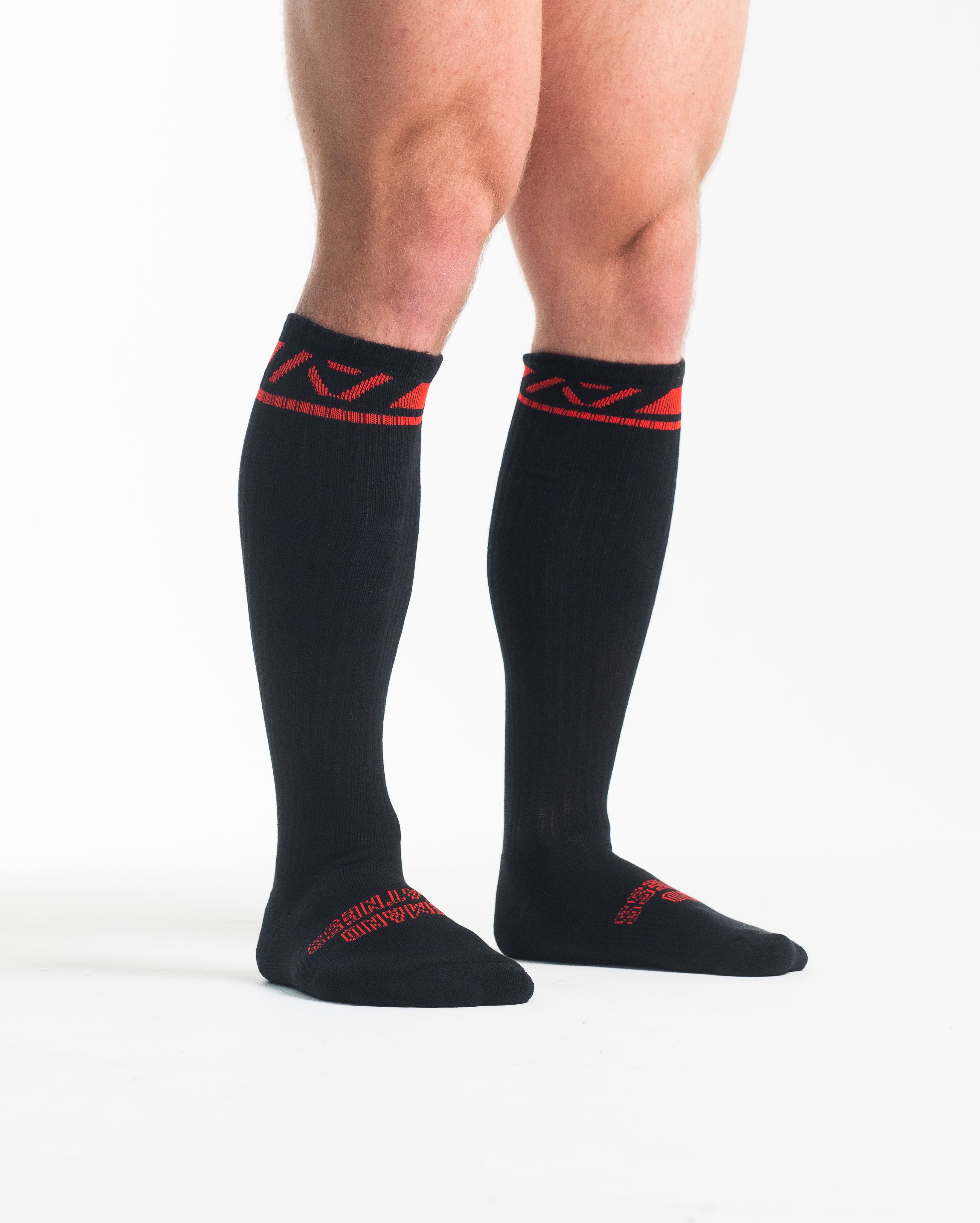 Side profile of A7 Deadlift Socks – Red Dawn, highlighting the A7 ankle logo and compression fit.