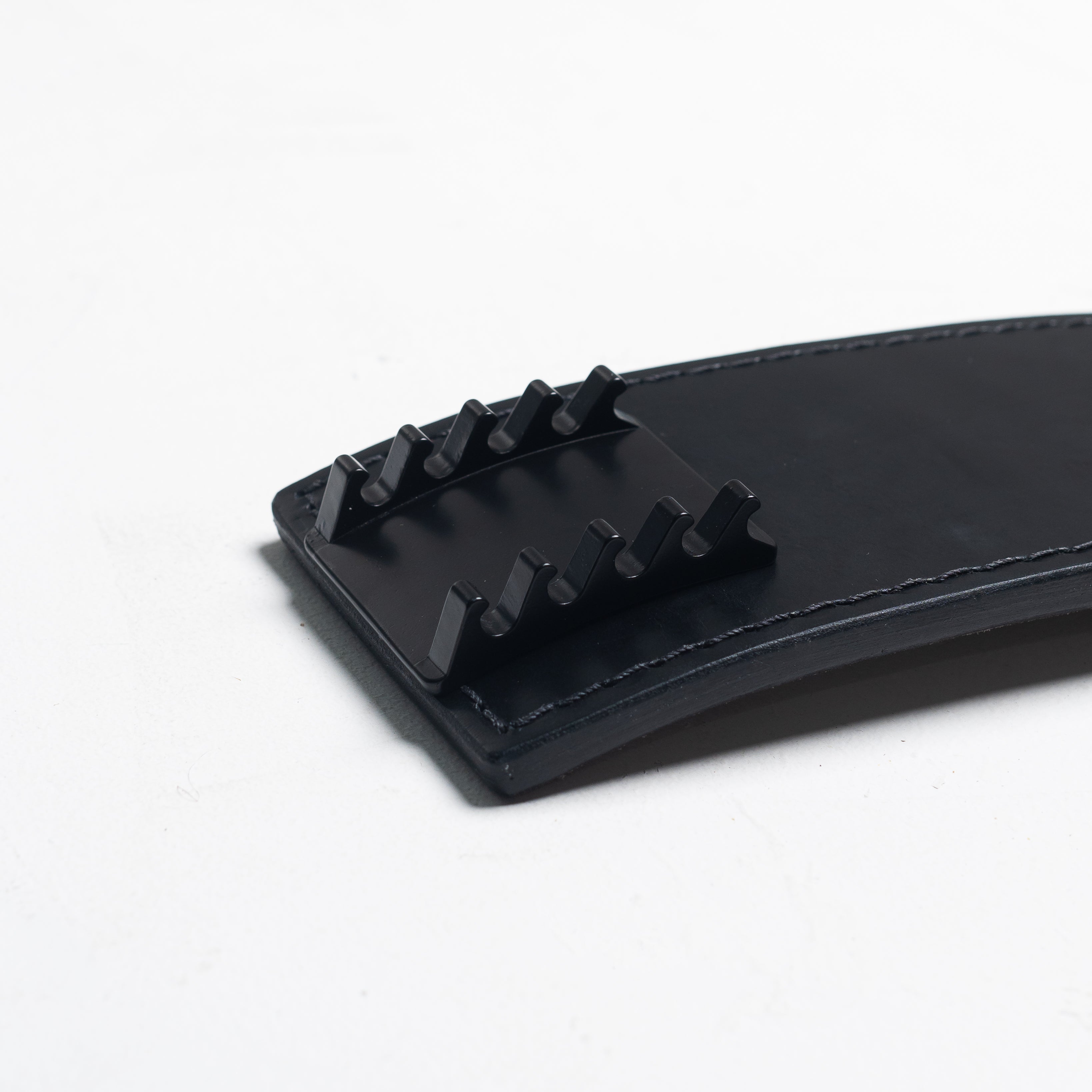 Close-up of the slotted adjustment rail on the A7 PAL Buckle allowing 0.5-inch precision settings.