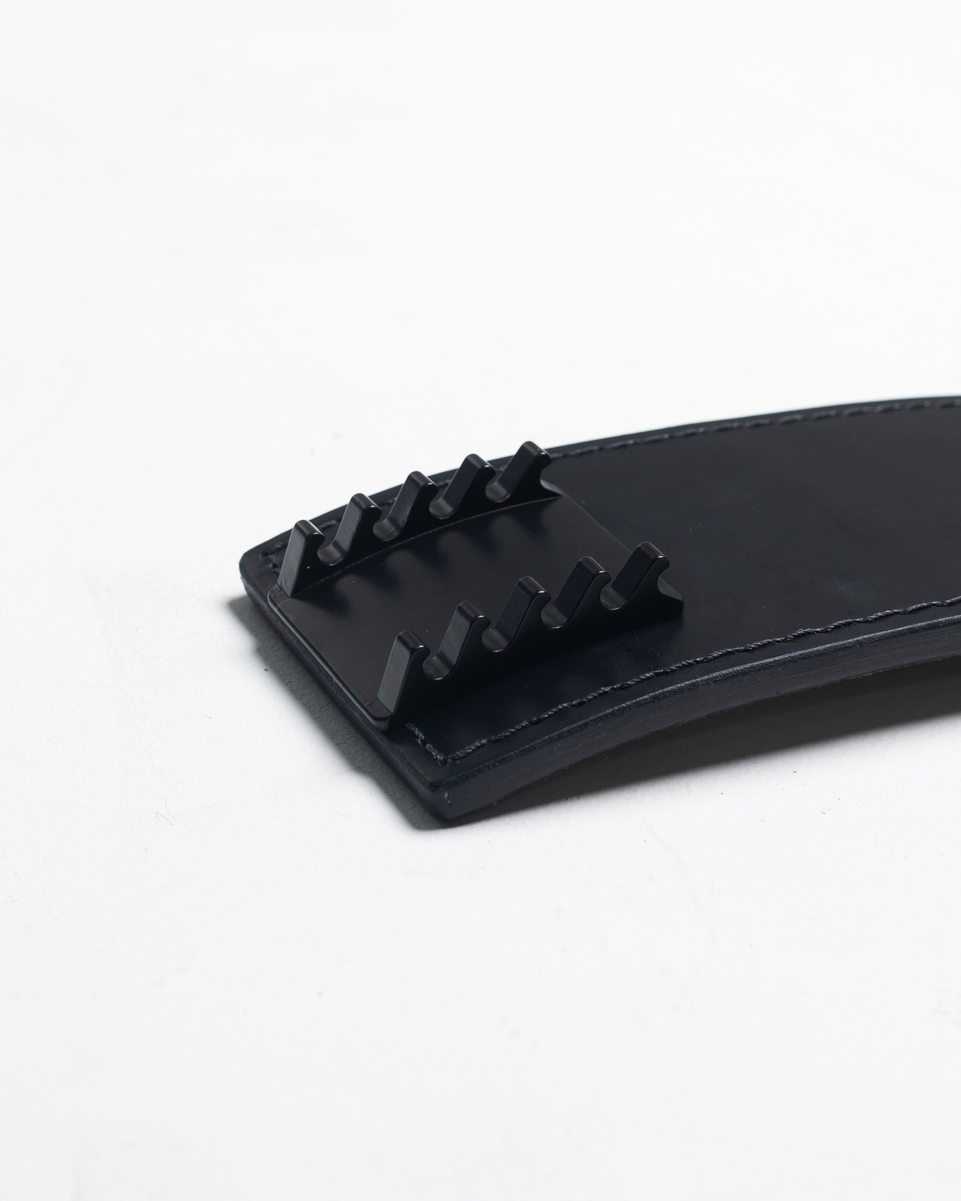 Close-up of the slotted adjustment rail on the A7 PAL Buckle allowing 0.5-inch precision settings.