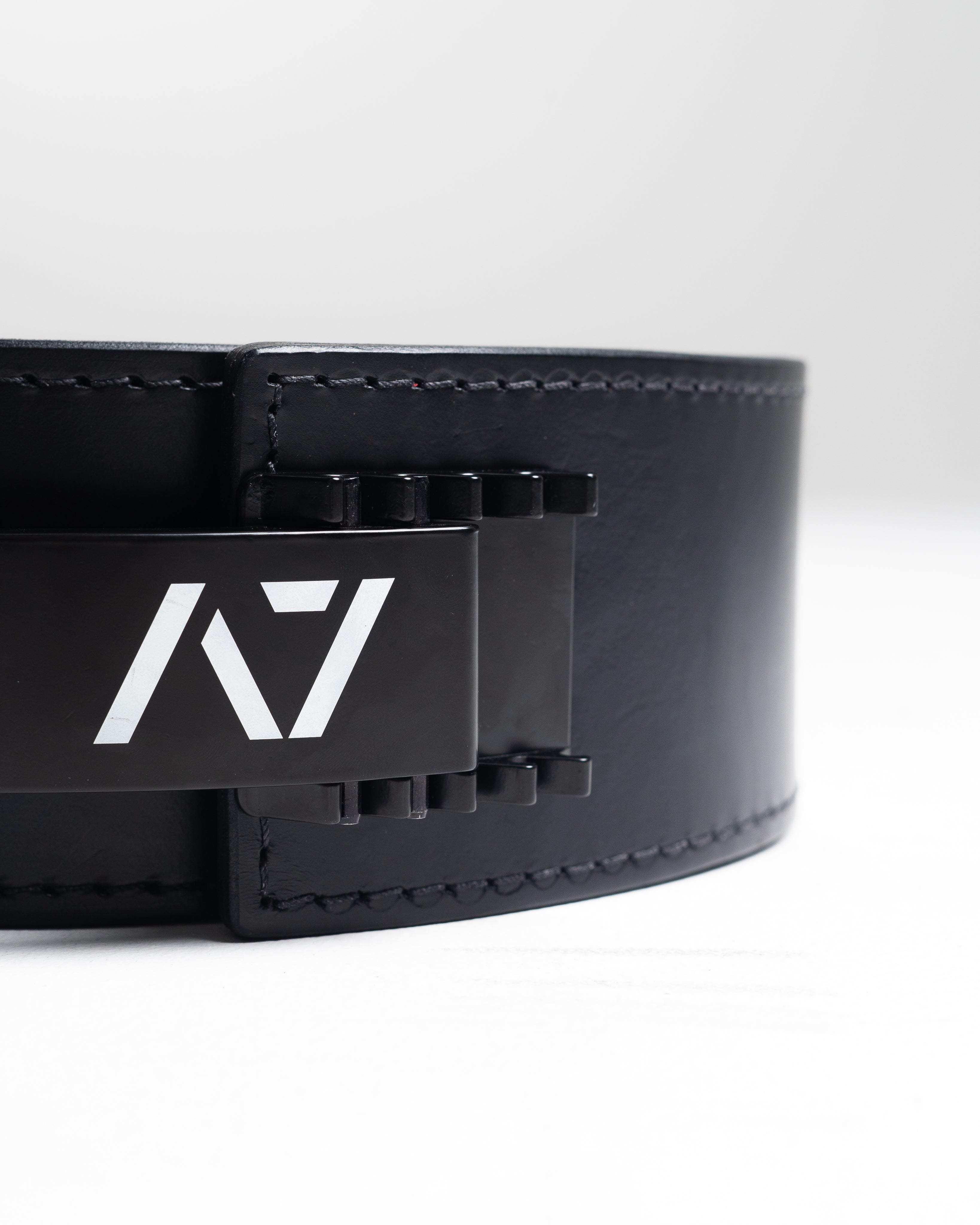 A7 PAL Buckle mounted on a leather lifting belt, showcasing fit and adjustable tension capability.