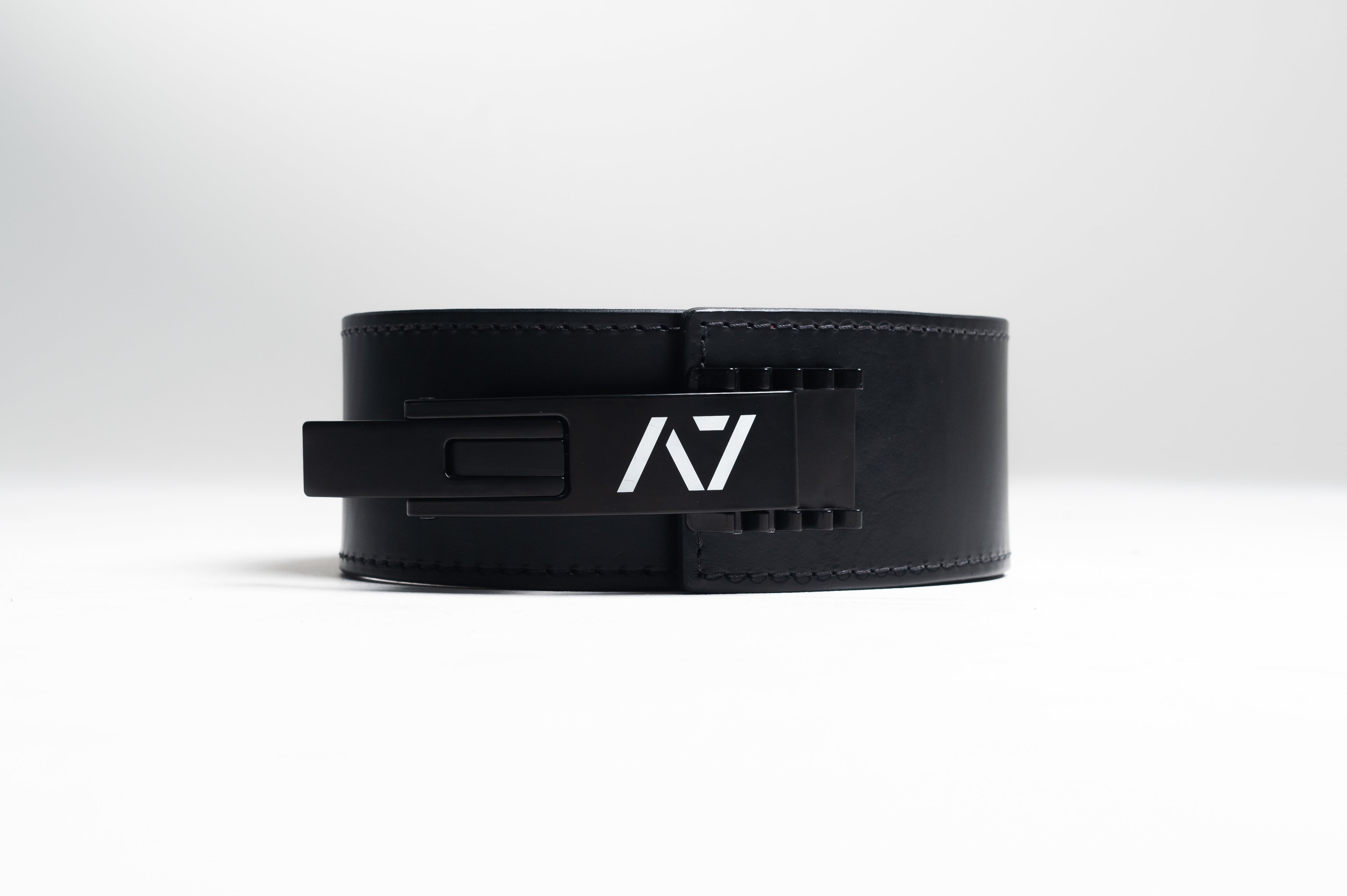 A7 PAL Buckle mounted on a leather lifting belt, showcasing fit and adjustable tension capability.