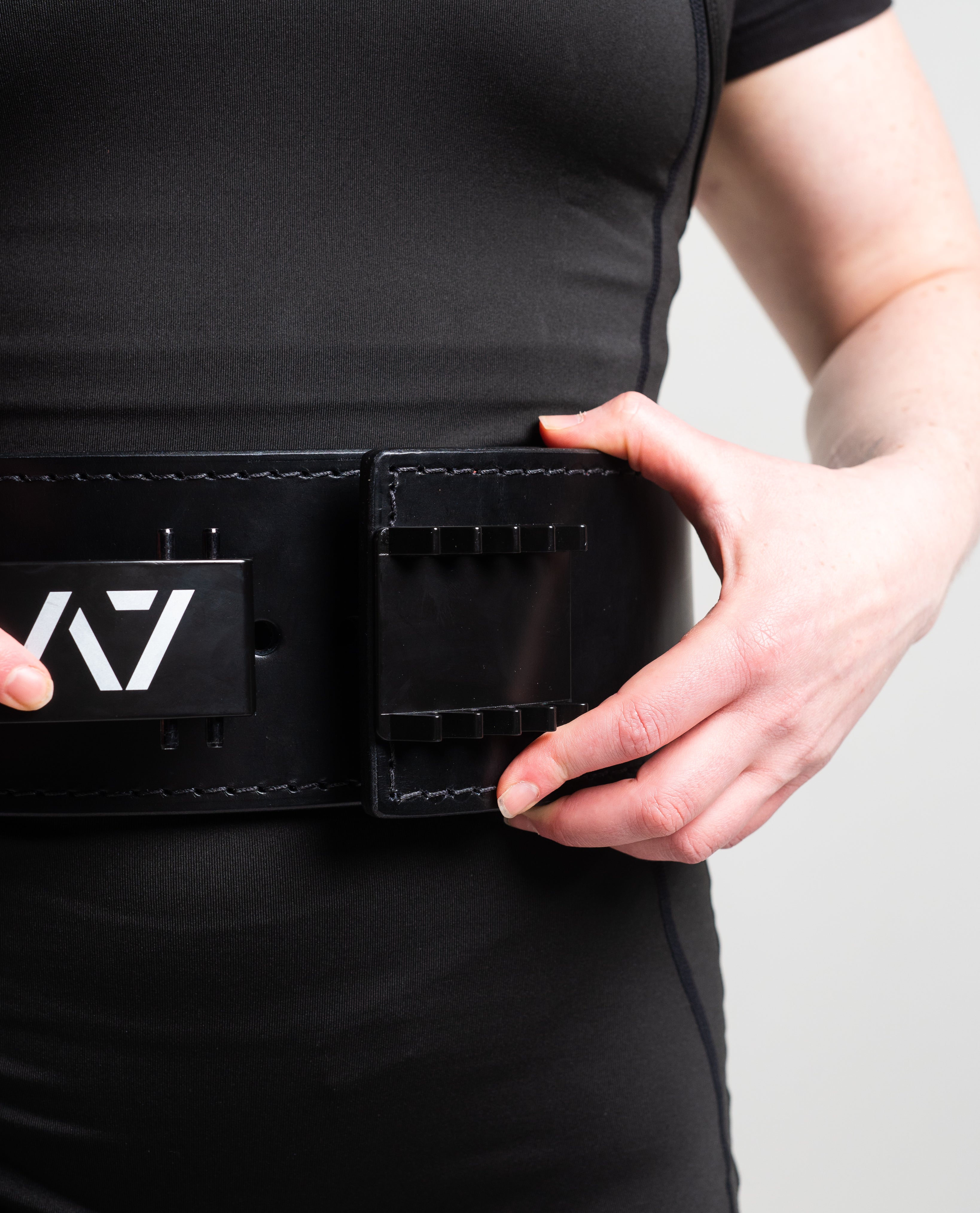 Showcasing A7 Pal Buckle on belt, on lifter.