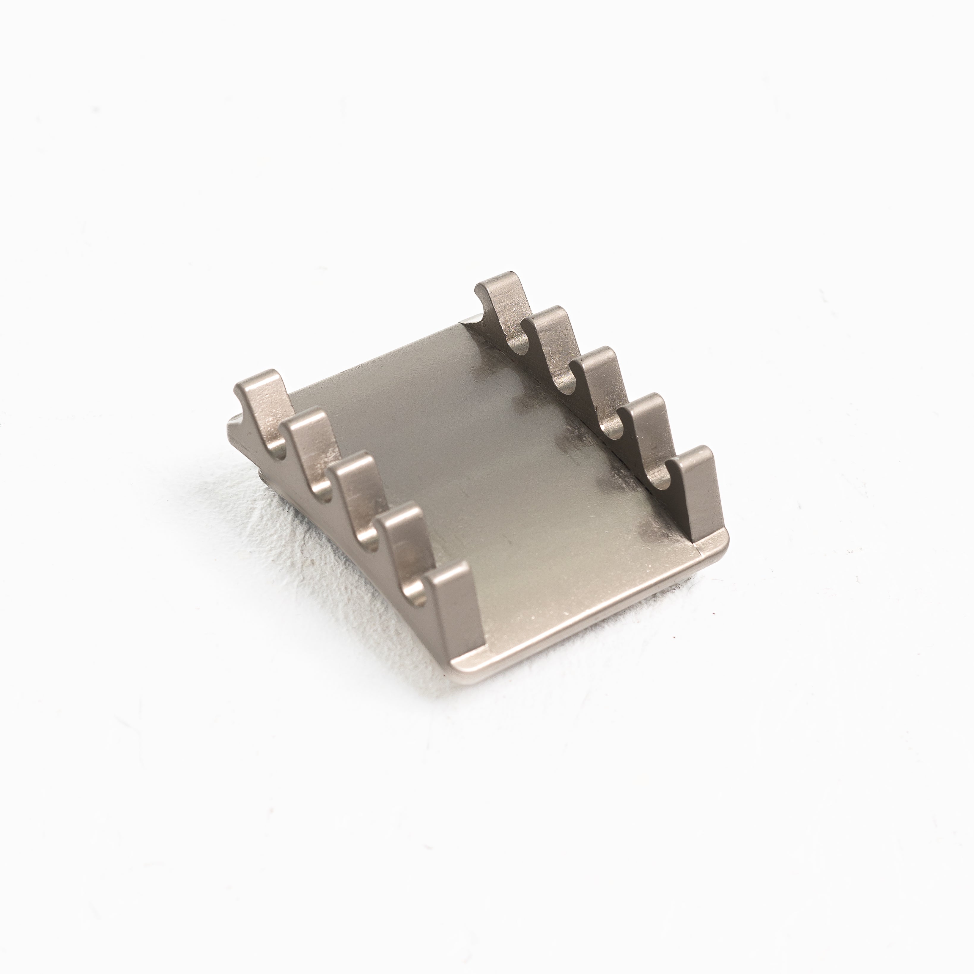 Close-up of the slotted adjustment rail on the silver PAL buckle for precise 0.5-inch tension control.