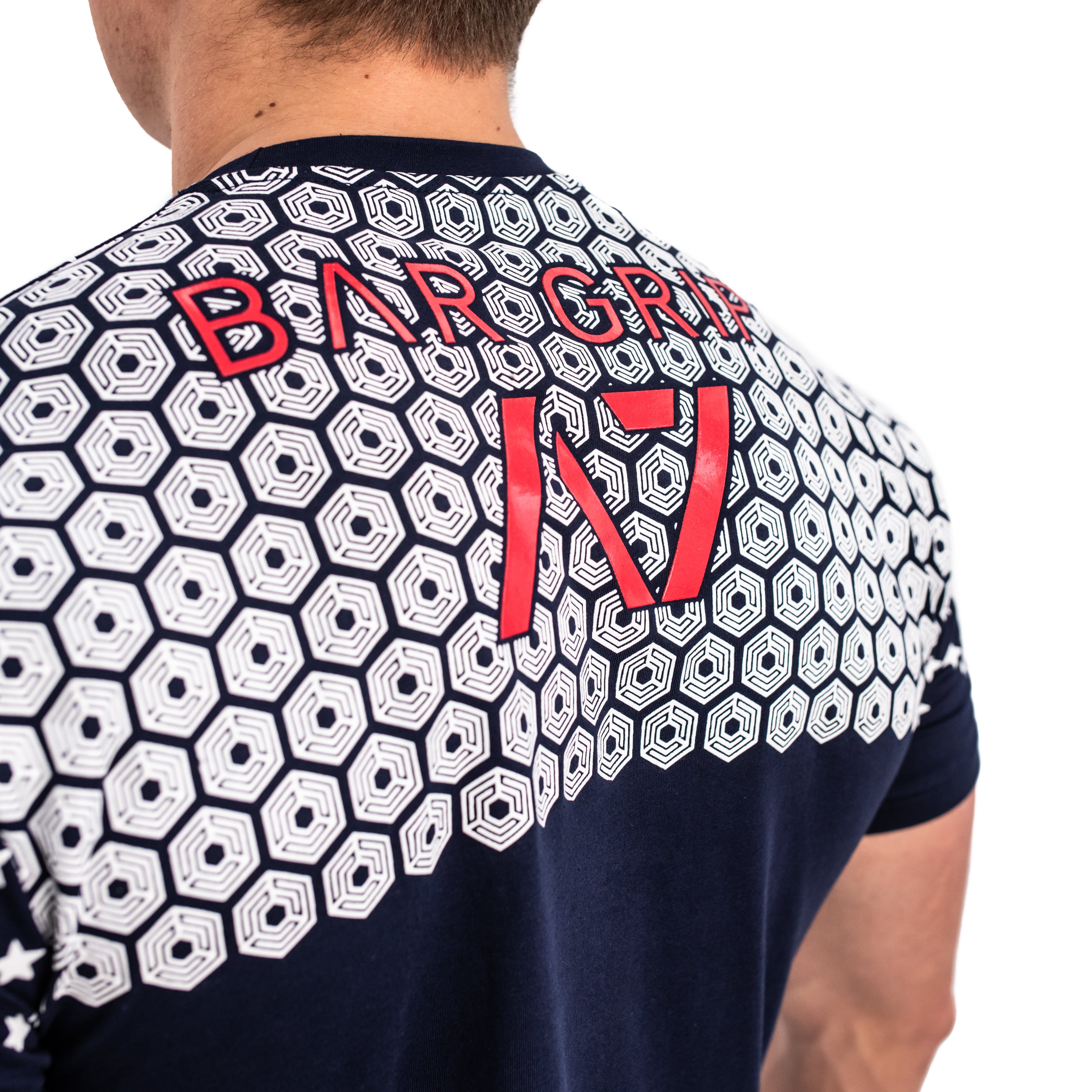 Close-up of the Bar Grip pattern on the back of the Americana Strongman Shirt, showcasing the textured grip zones designed to prevent bar or log slippage during strongman lifts.