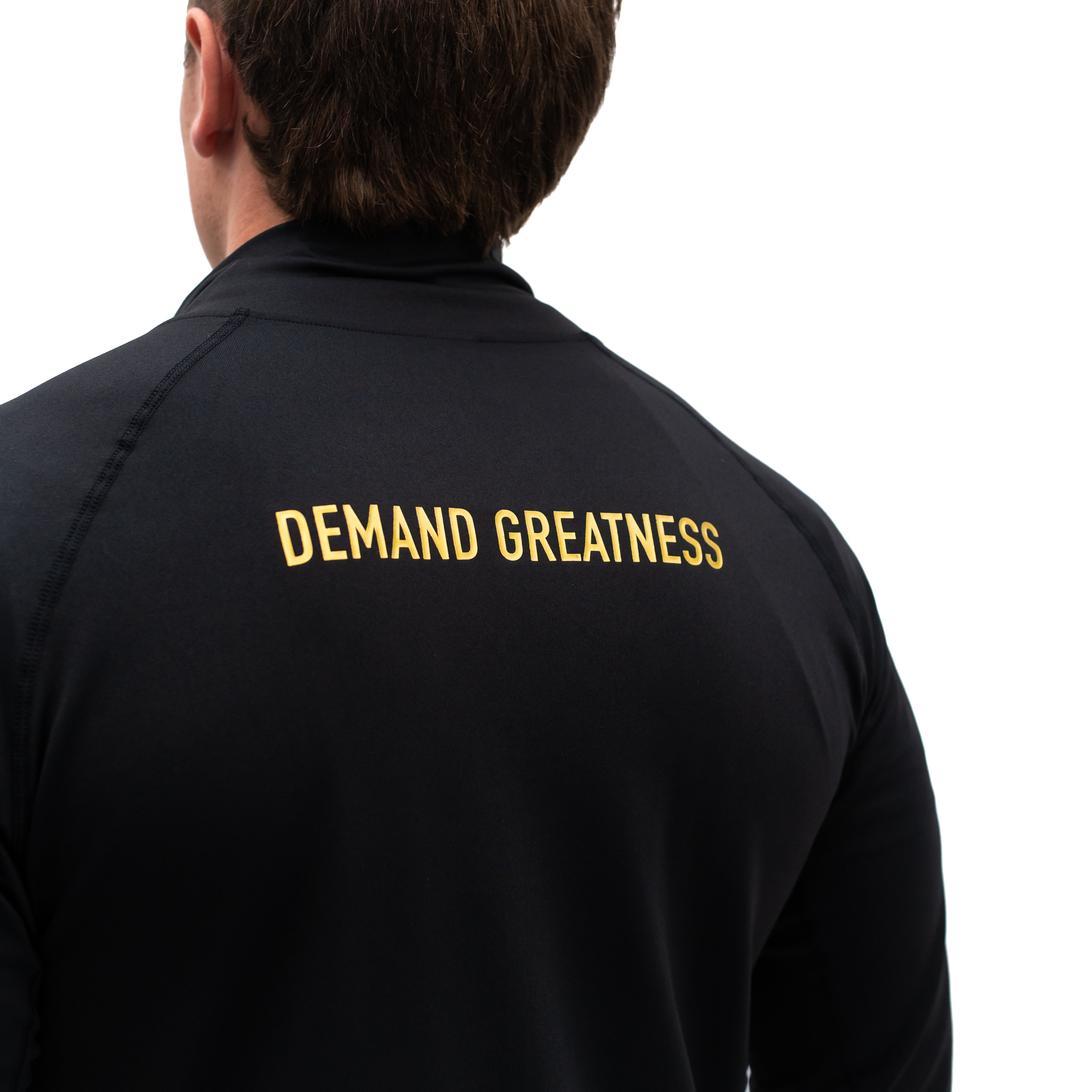 "Demand Greatness" in gold
