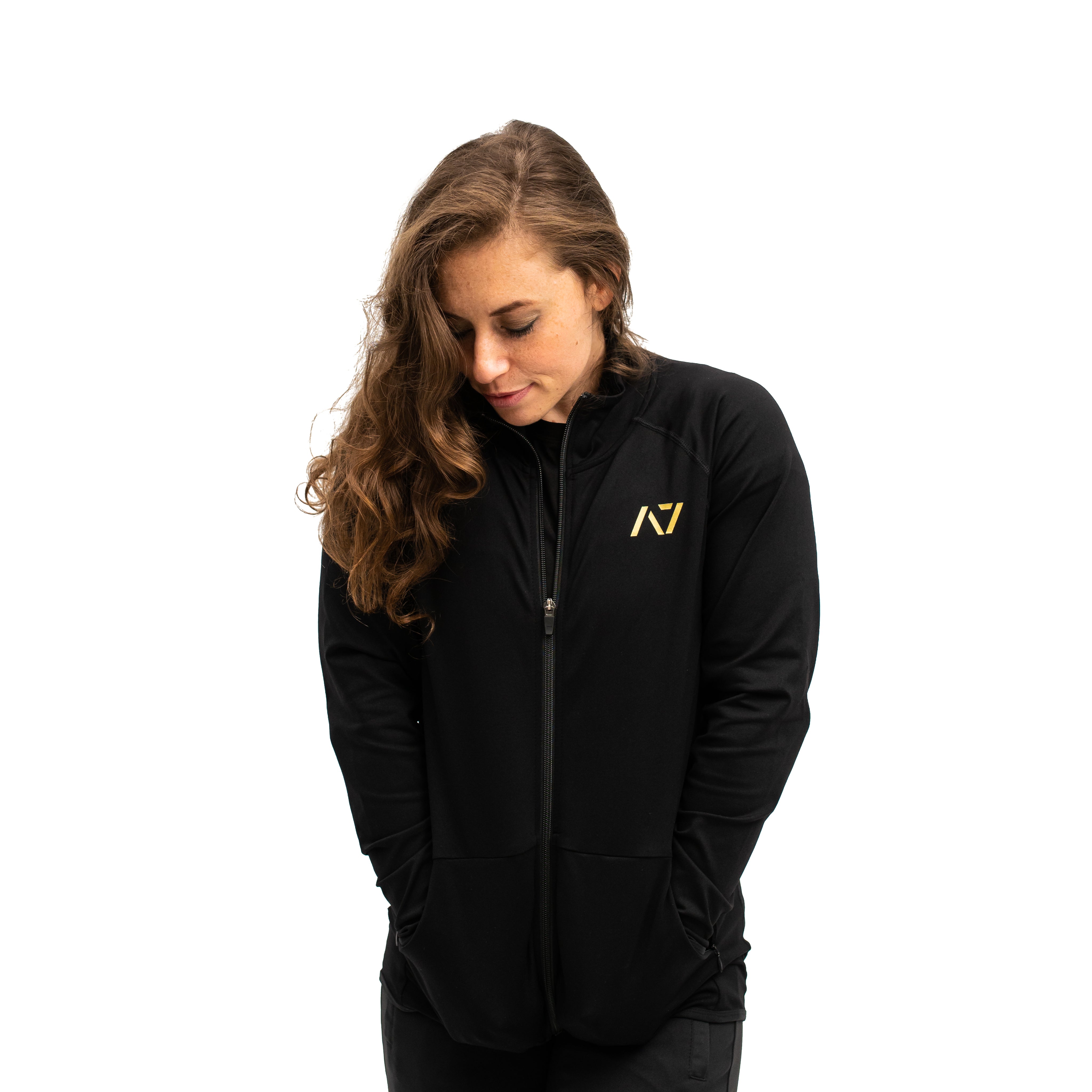 Front view of Defy Jacket – Gold Standard with zip-up collar and gold A7 logo.