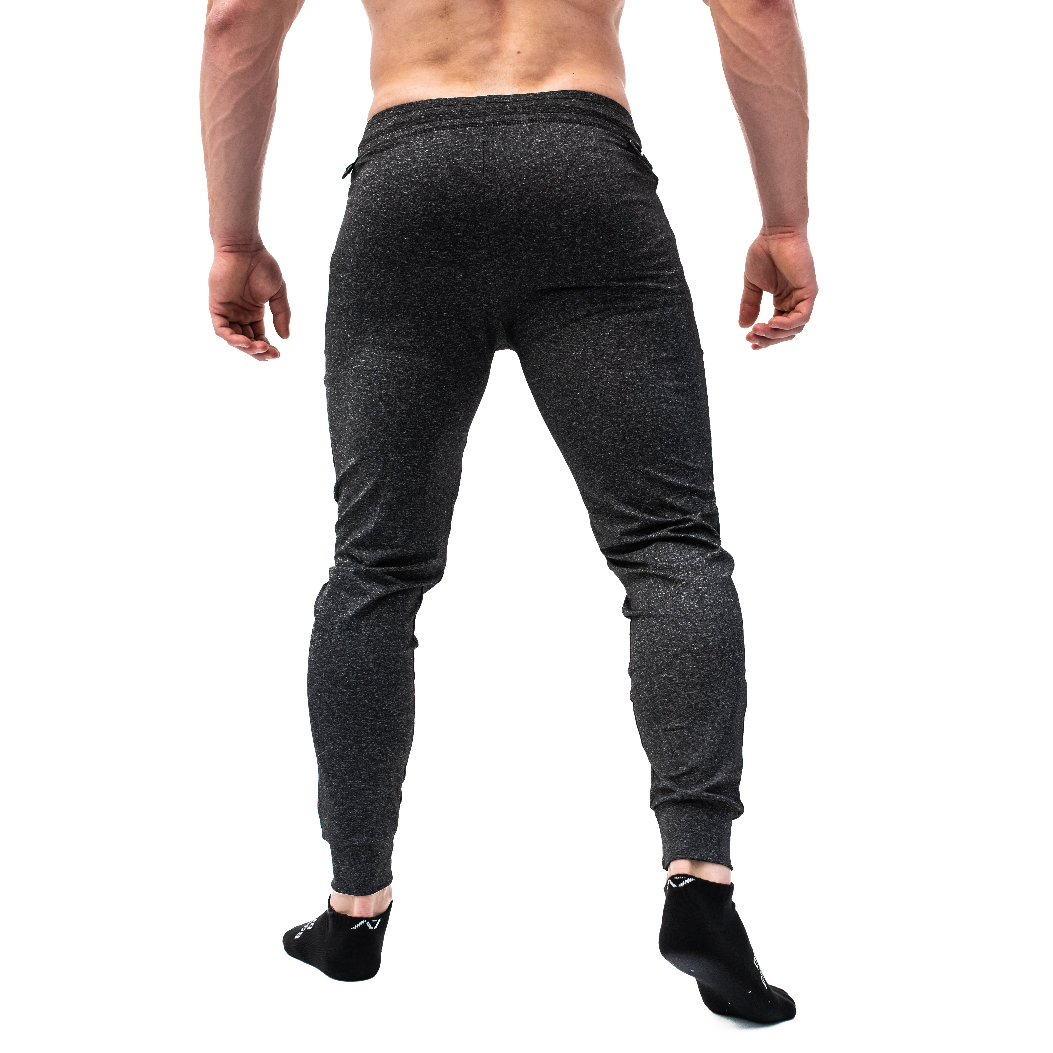 Rear view of Charcoal Defy Joggers highlighting the clean back line and tapered silhouette.