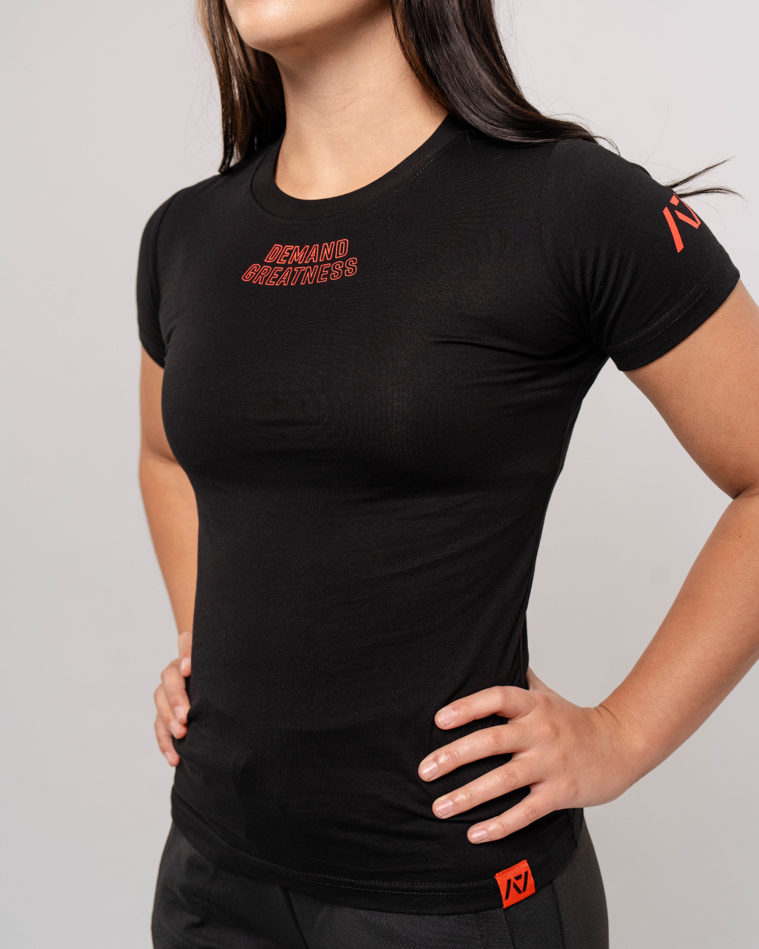 
                  
                    Demand Greatness True-Fit Women's Meet Shirt - Red Dawn
                  
                