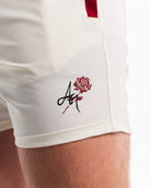 Close Up of unique A7 logo with rose in the background