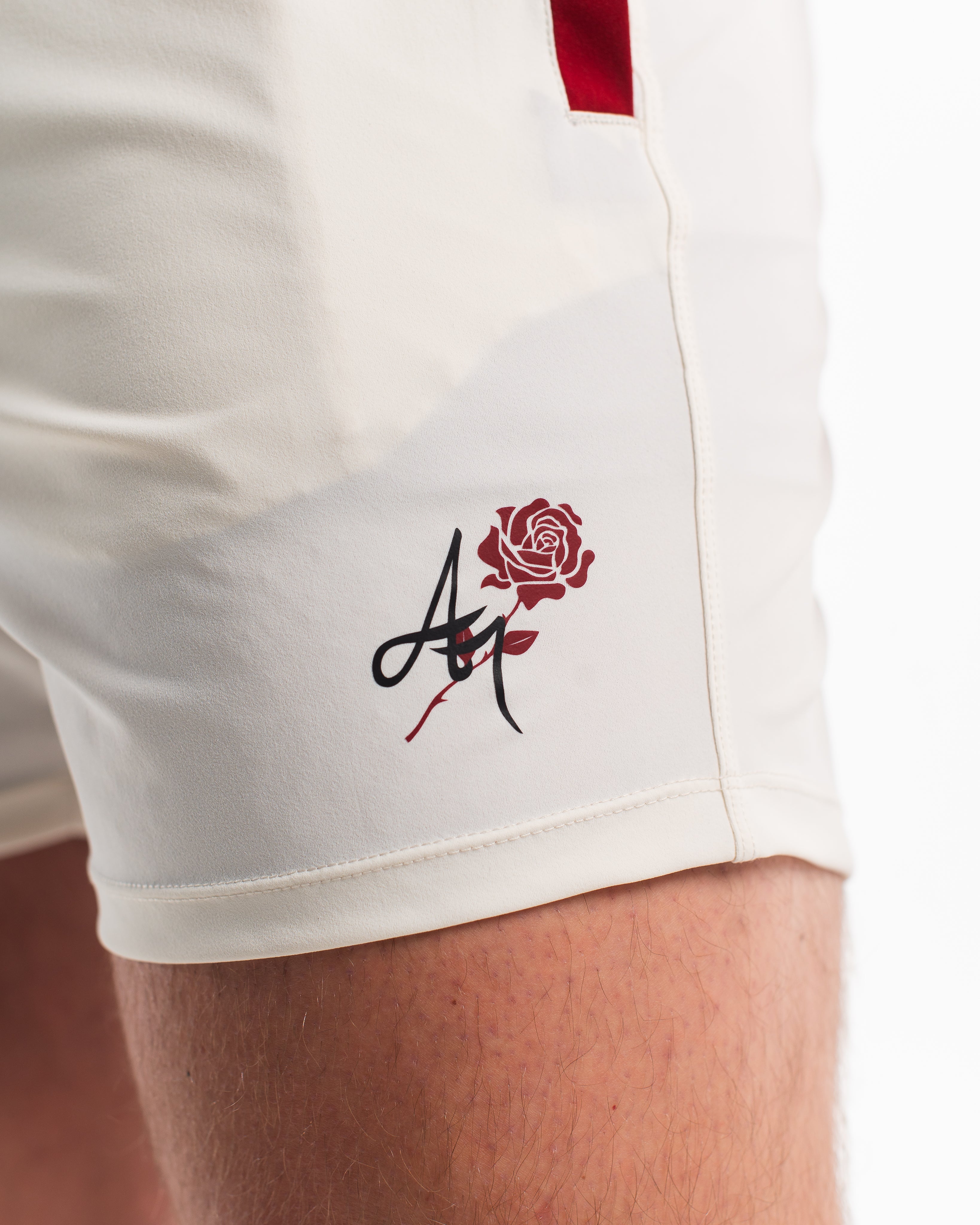 Close Up of unique A7 logo with rose in the background