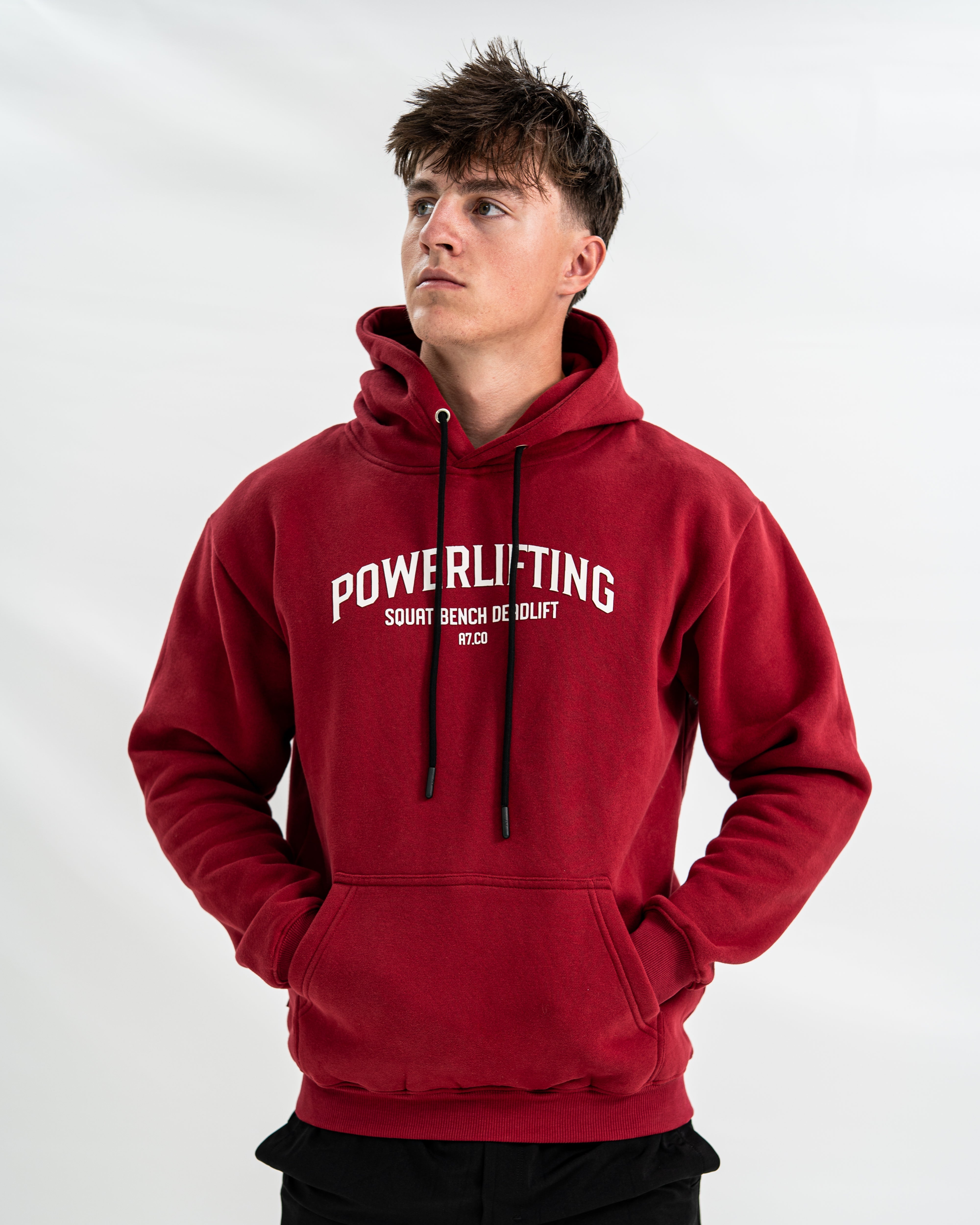 Male wearing a red Bar Grip hoodie with 'Powerlifting' text on a white background